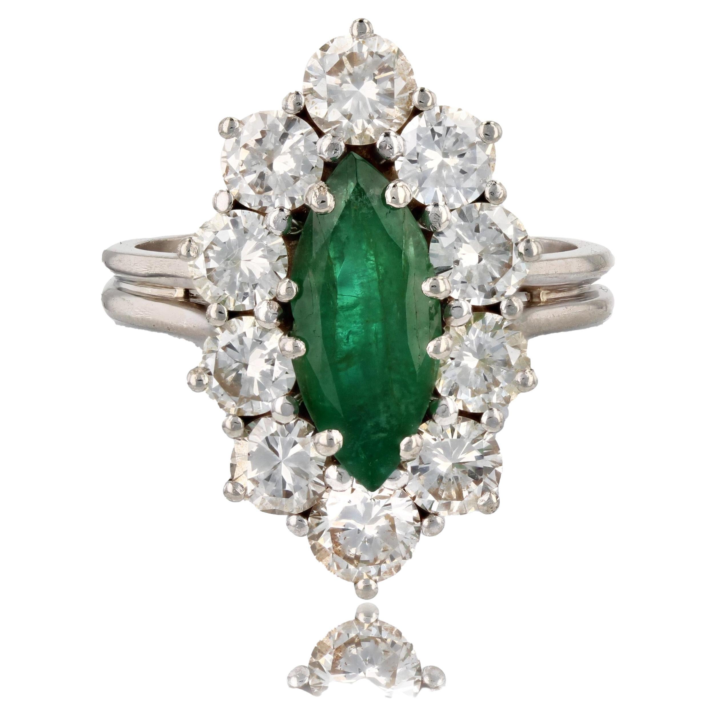 French 1970s Emerald Diamonds 18 Karat White Gold Marquise Ring For Sale