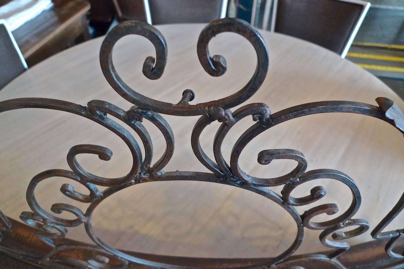 French, 1970s iron and wood fireplace screen.
  