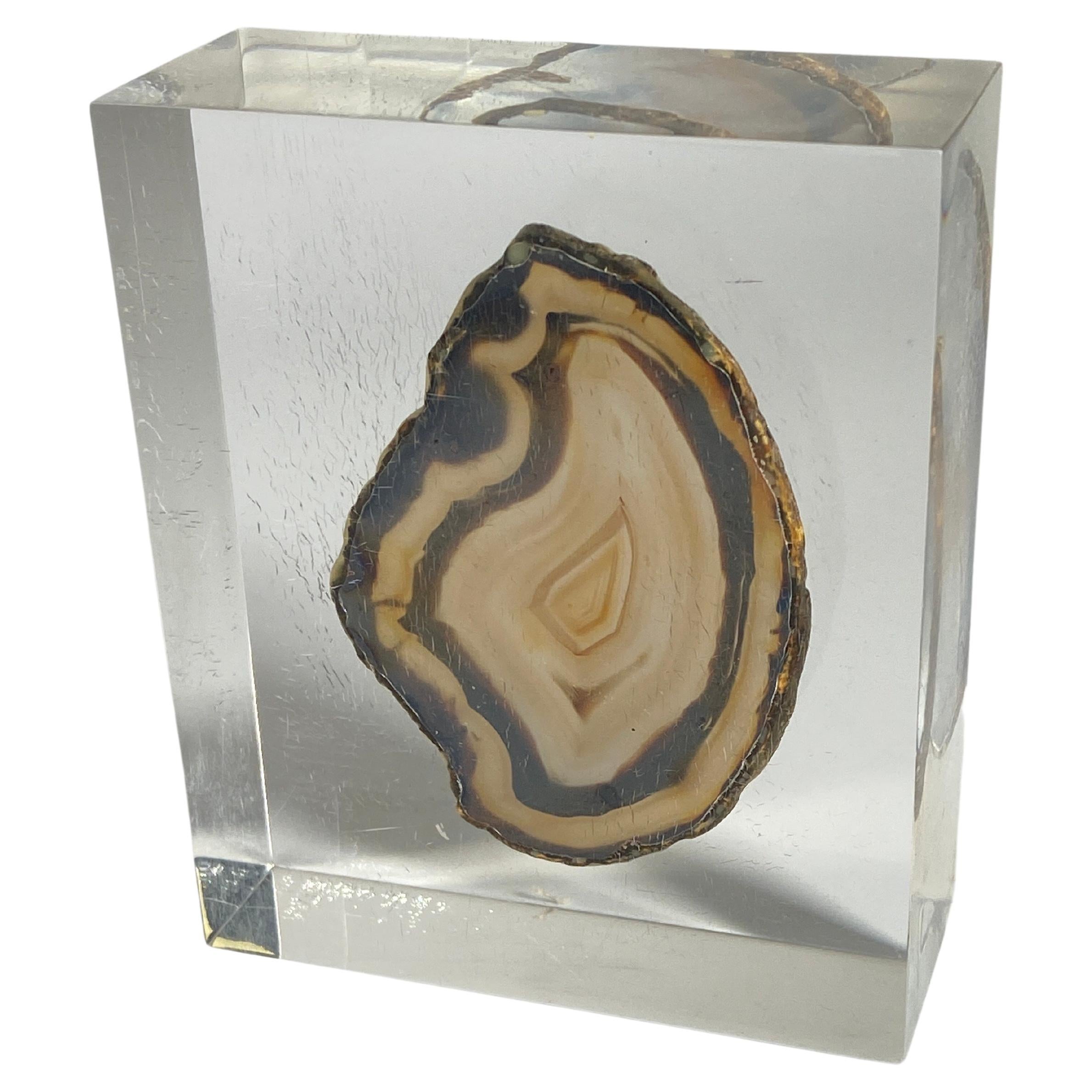 This item is a sculpture, made in France Circa 1970. It is a cube of resin, with in the inside an inclusion of an Agate Stone.