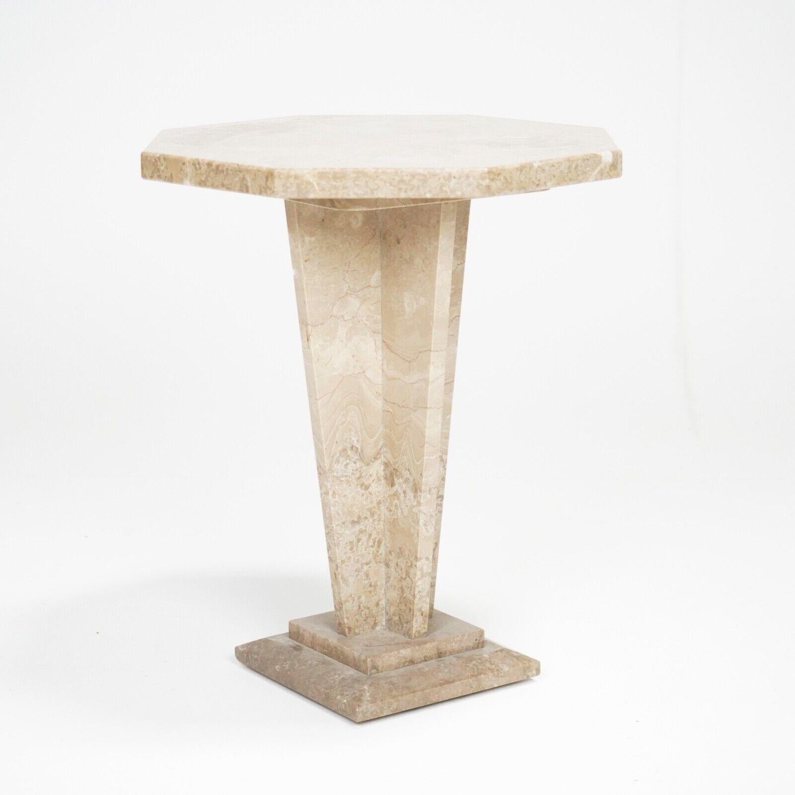 A French marble side table with octagonal top and cruciform stem on a stepped base. Made from marble, every side unique in its natural patterns. Condition is very good.

Condition 
Please do take a careful look at all our pictures and note that