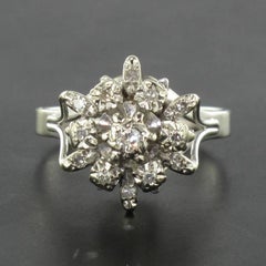 French 1970s Retro Diamond 18 Karat White Gold SnowFlake Engagement Ring
