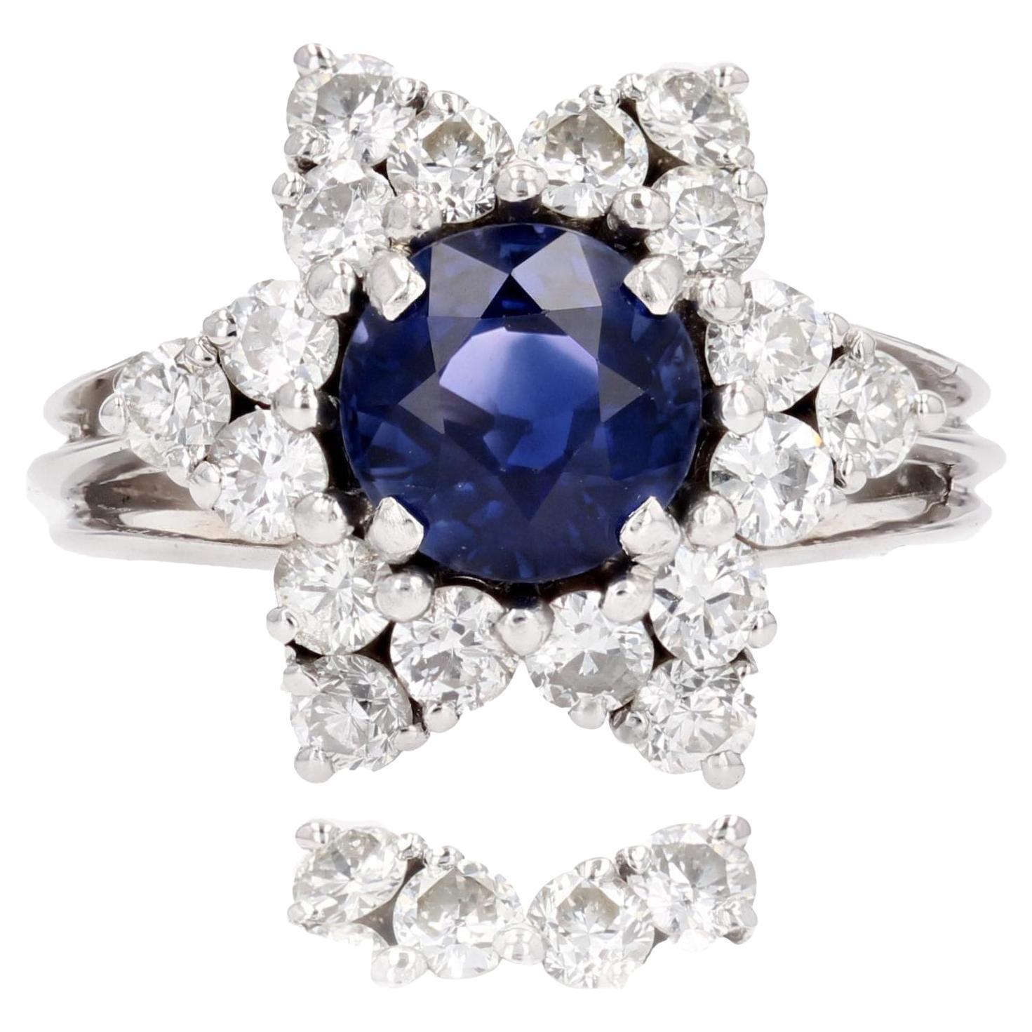 French 1970s Sapphire Diamonds 18 Karat White Gold Snowflake Ring For Sale