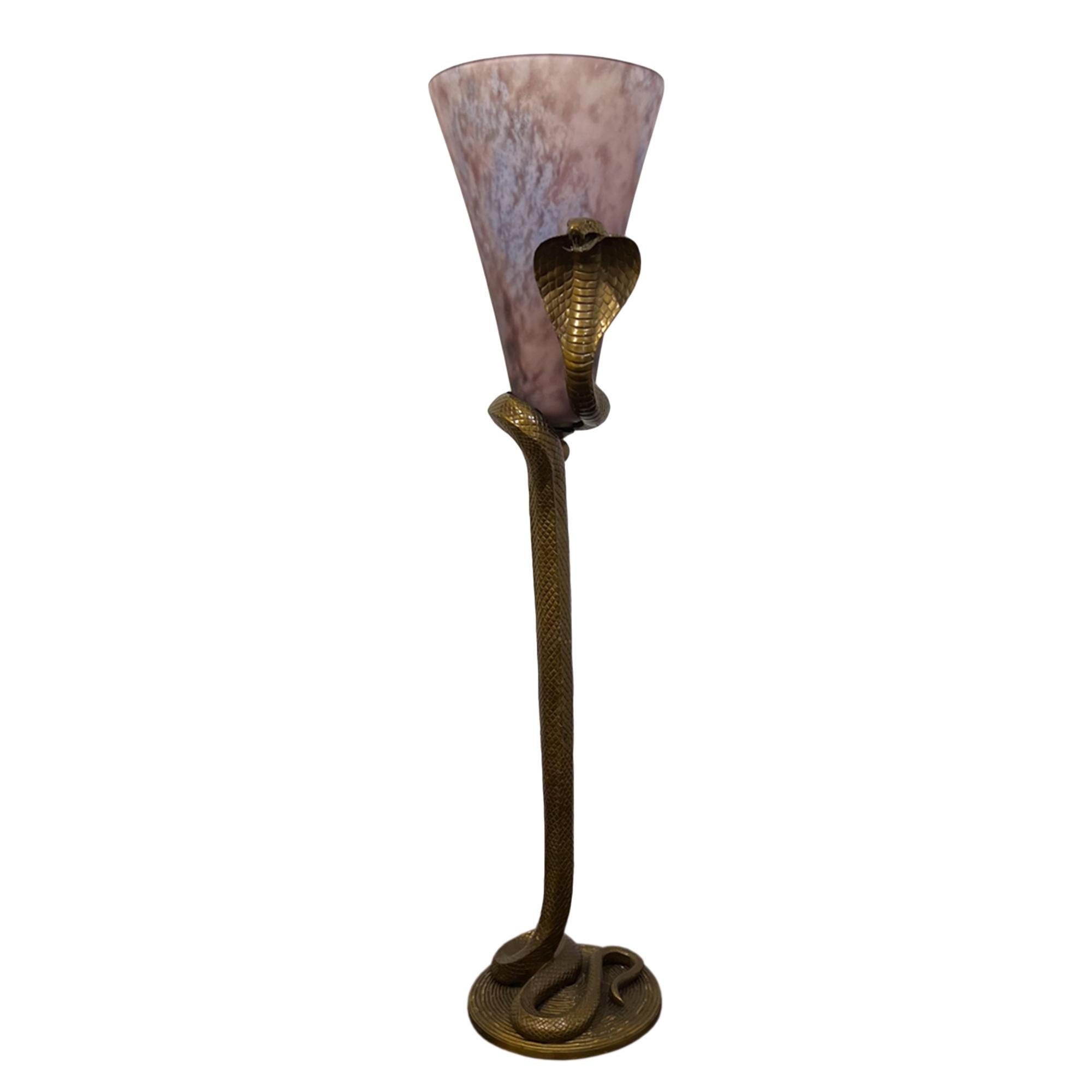 This fantastic table lamp in the shape of a very lifelike snake has it's original glass shade and was made in the manner of Edgar Brandt. 

We've had it rewired with black rope twisted flex. 

A unique light!