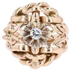 French 1980s Diamond 18 Karat Yellow Gold Retro Interlaced Ring