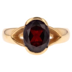 French 1980s Garnet 18 Karat Yellow Gold Bangle Ring