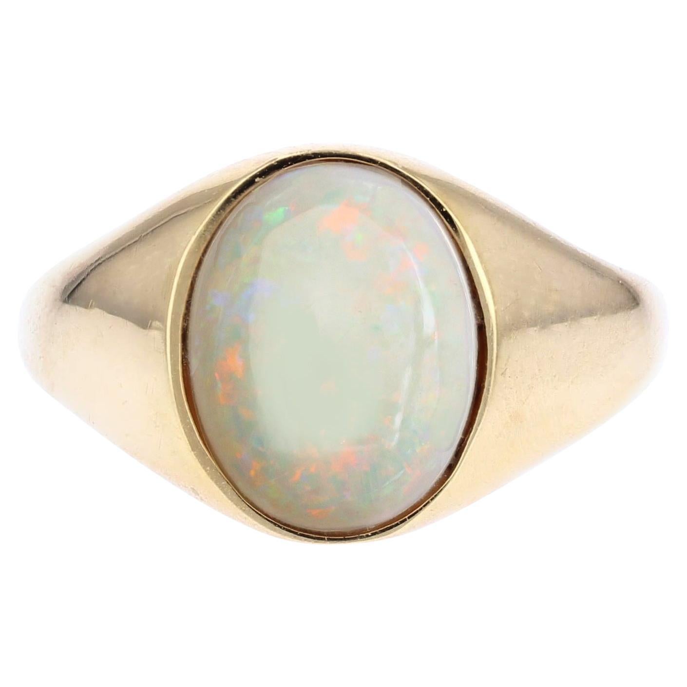 Anello francese anni 
80 con opale in oro giallo 18 carati, con braccialetto retrò in vendita