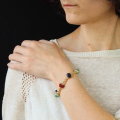 Französisch 1980er Jahre Saphire Rubine Smaragde 18 Karat Gelbgold-Armband