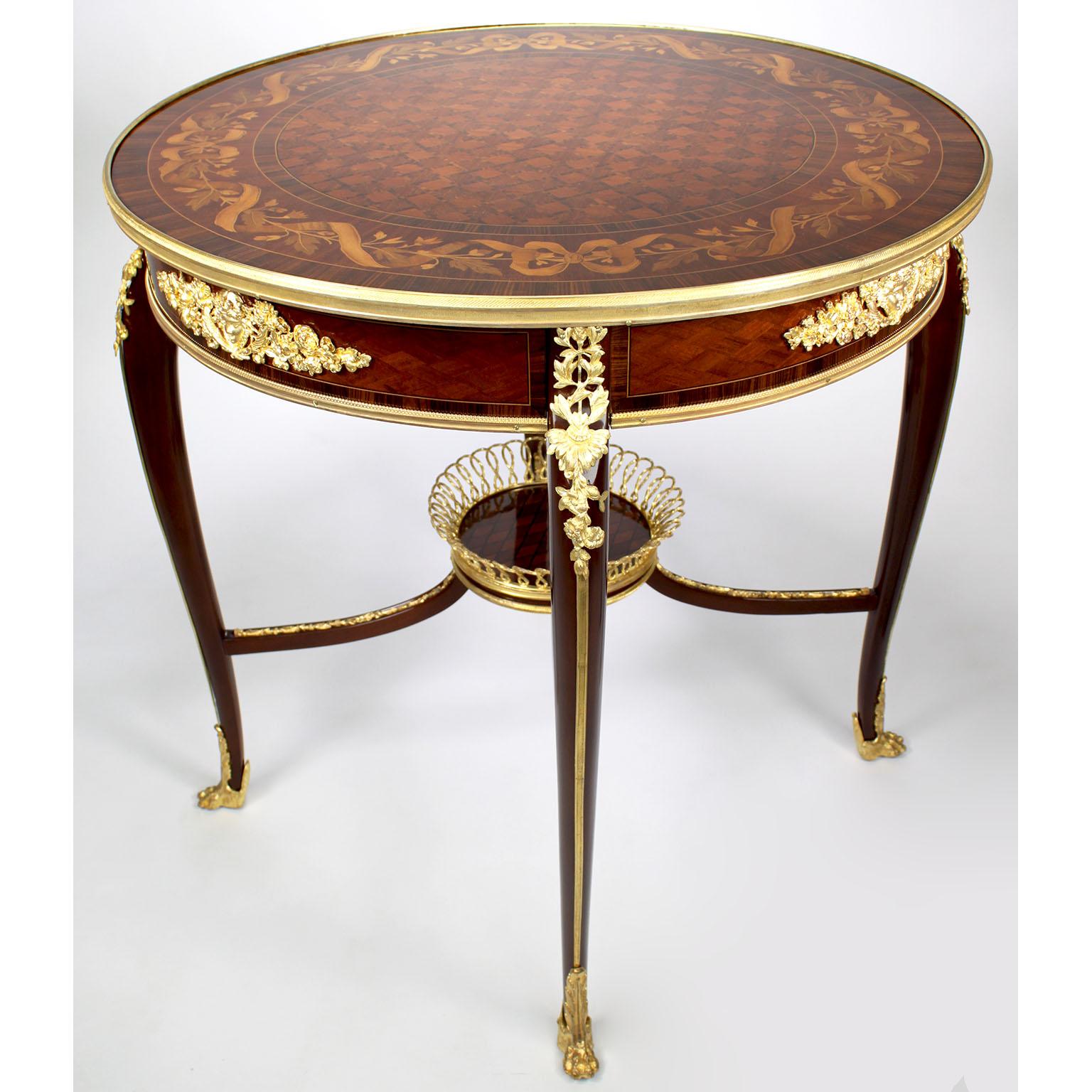 Louis XV Table circulaire en marqueterie et bronze doré, d'après François Linke, du 19e au 20e siècle. en vente