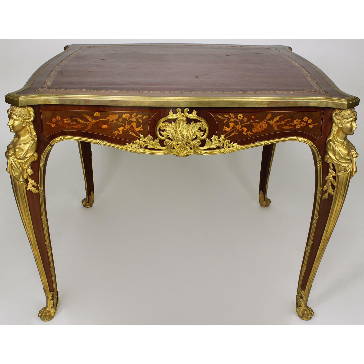 A very fine French 19th-20th century Louis XV style mahogany, satinwood and Kingwood marquetry ormolu mounted figural game table, attributed to François Linke (1855-1946). The square body surmounted with female ormolu caryatids on each corner, on