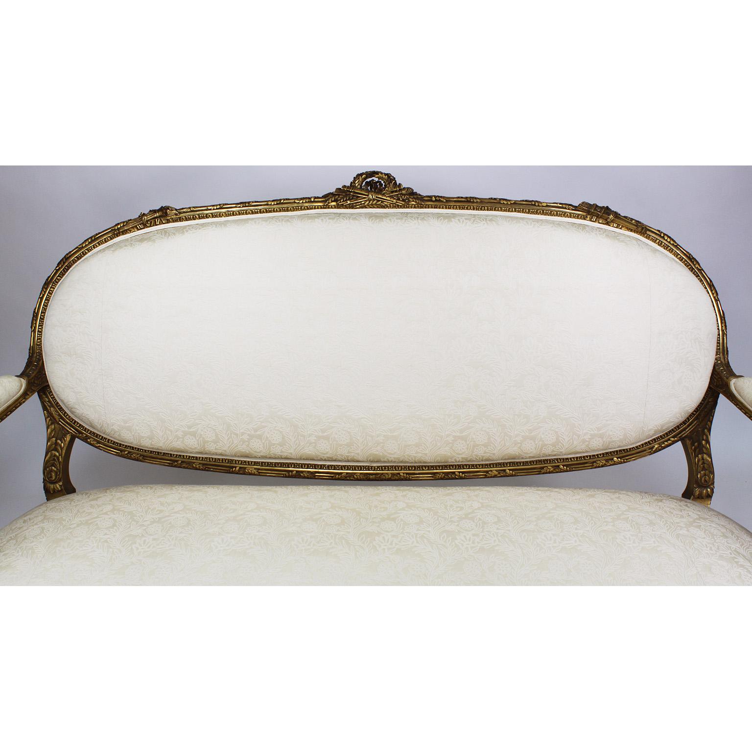 Early 20th Century French 19th-20th Century Louis XVI Style Giltwood Carved Settee, François Linke For Sale
