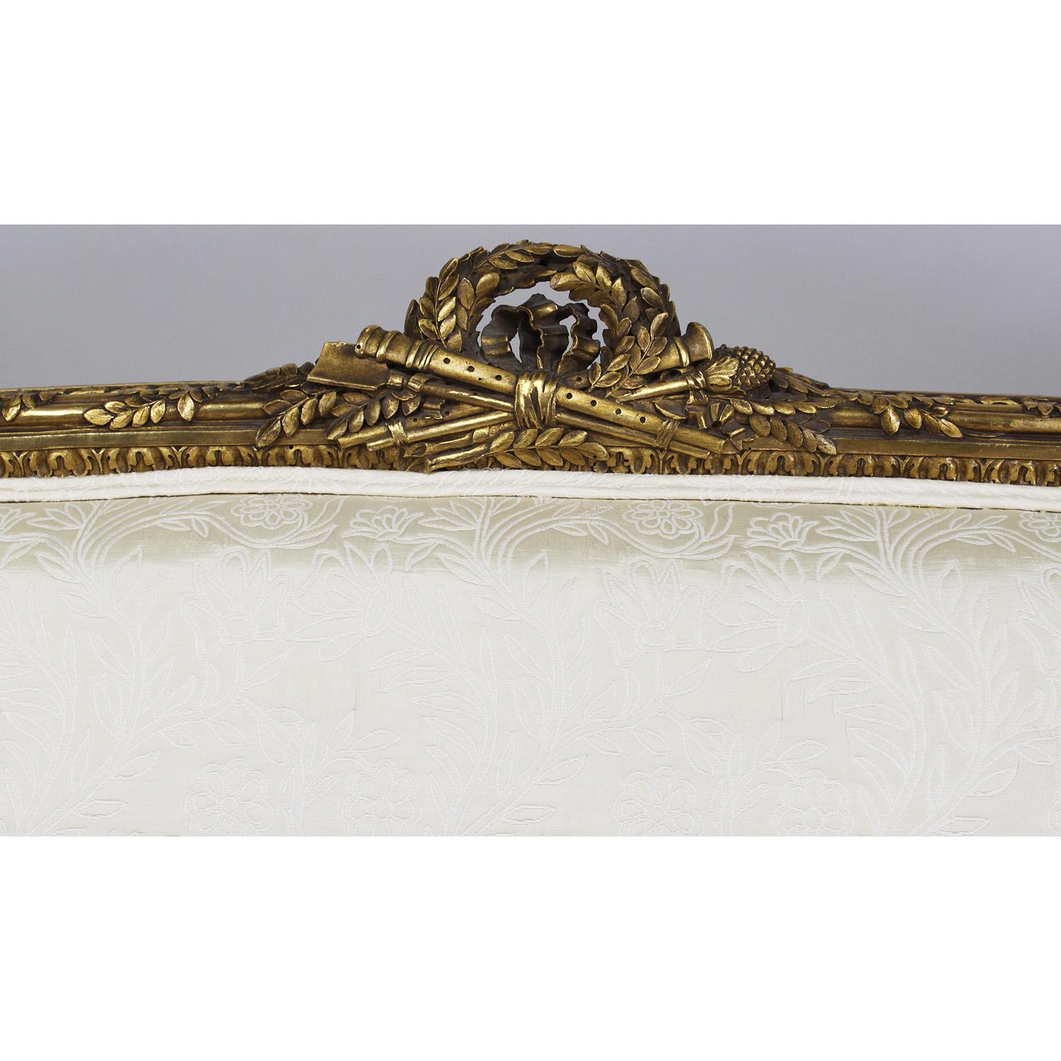 Fabric French 19th-20th Century Louis XVI Style Giltwood Carved Settee, François Linke For Sale