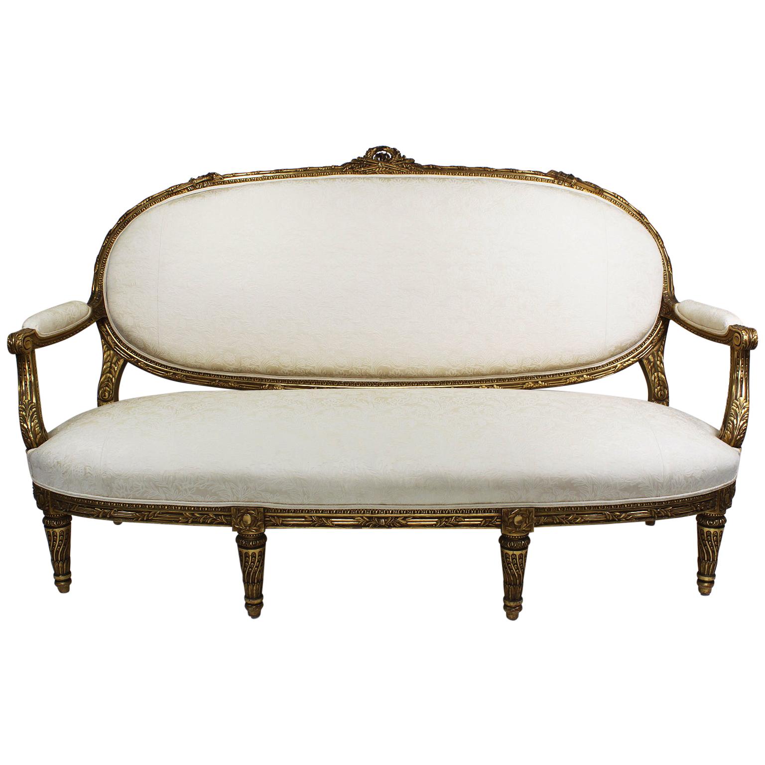 French 19th-20th Century Louis XVI Style Giltwood Carved Settee, François Linke For Sale