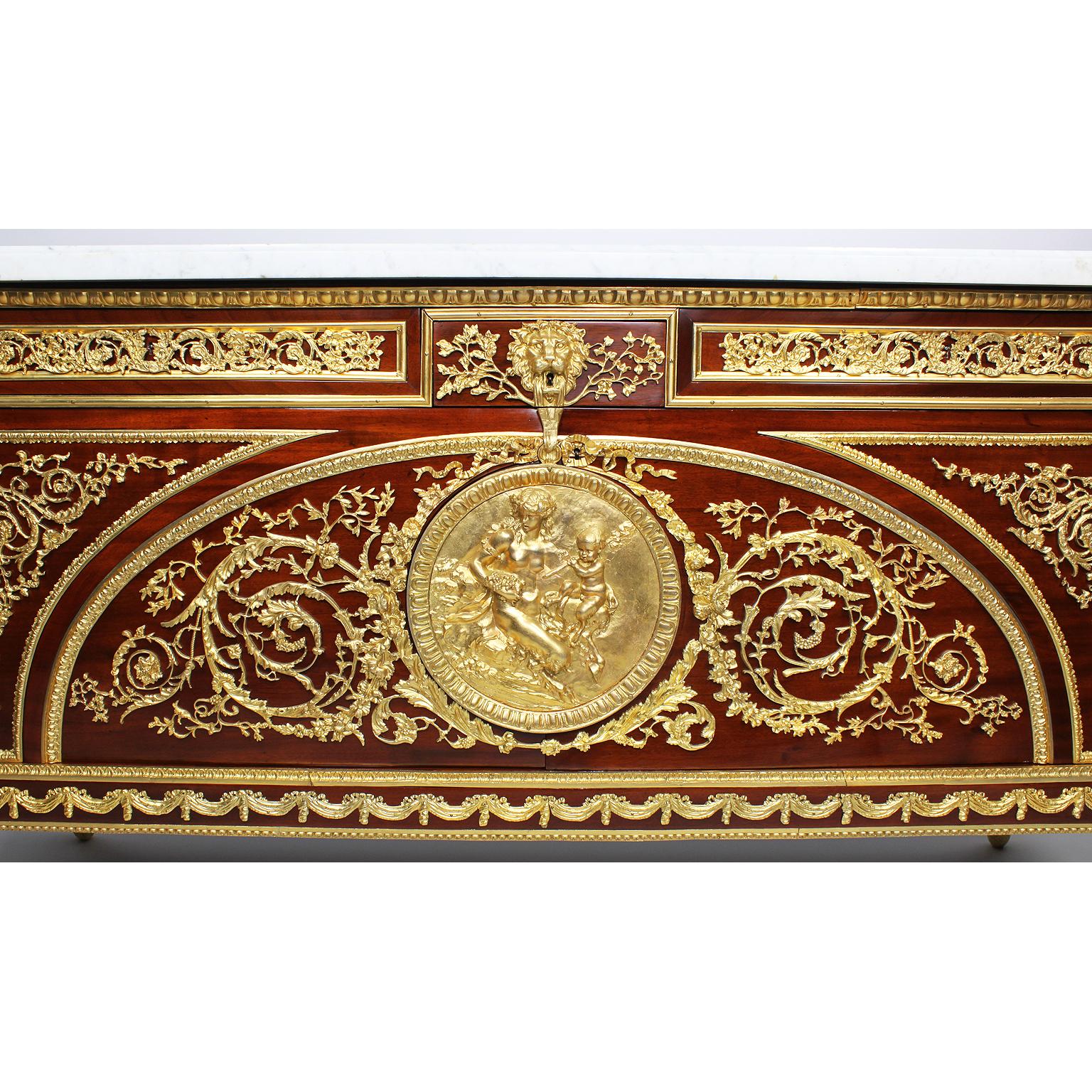 A French Louis XVI style mahogany and gilt-bronze mounted 