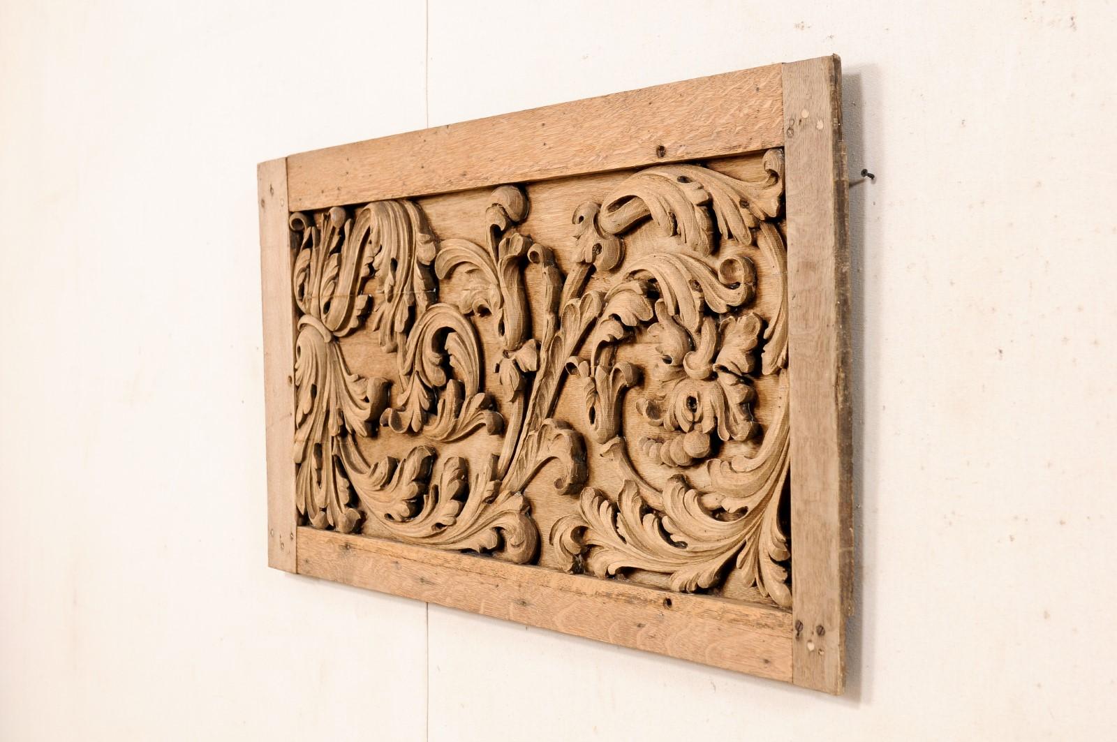 carved wooden wall plaque