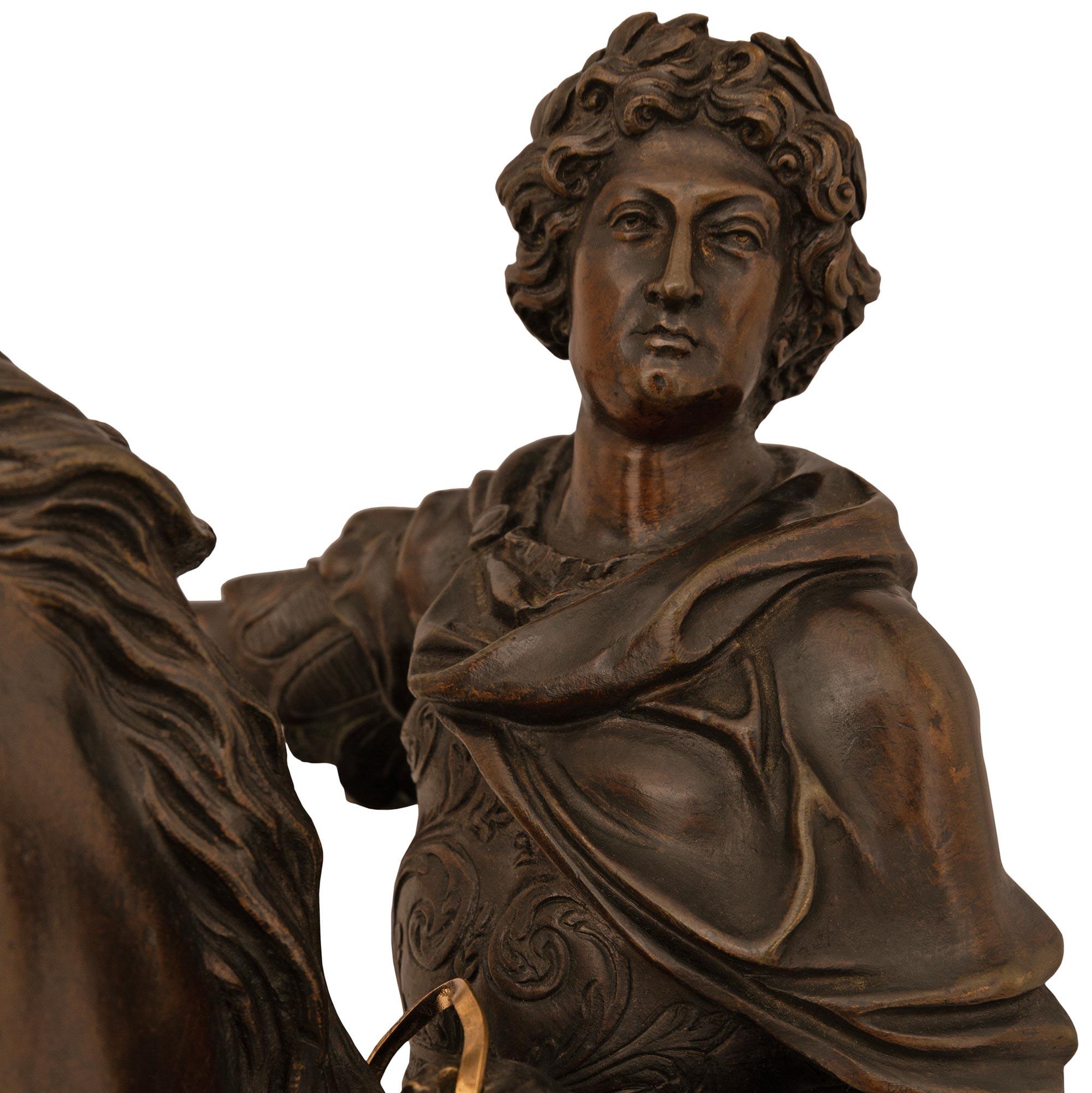 A handsome and most impressive French 19th century Louis XIV st. patinated Bronze, Ormolu, and Boulle statue of King Louis XIV. This wonderful statue is modeled after the statue of Louis XIV in the middle of the Place des Victoires, Paris. The