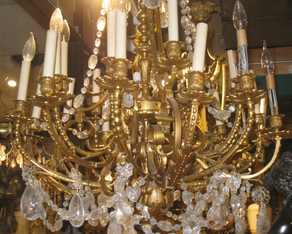 Gilt French 19th C Louis XV XVI Style 16 Light Bronze Chandelier with Rock Crystal For Sale