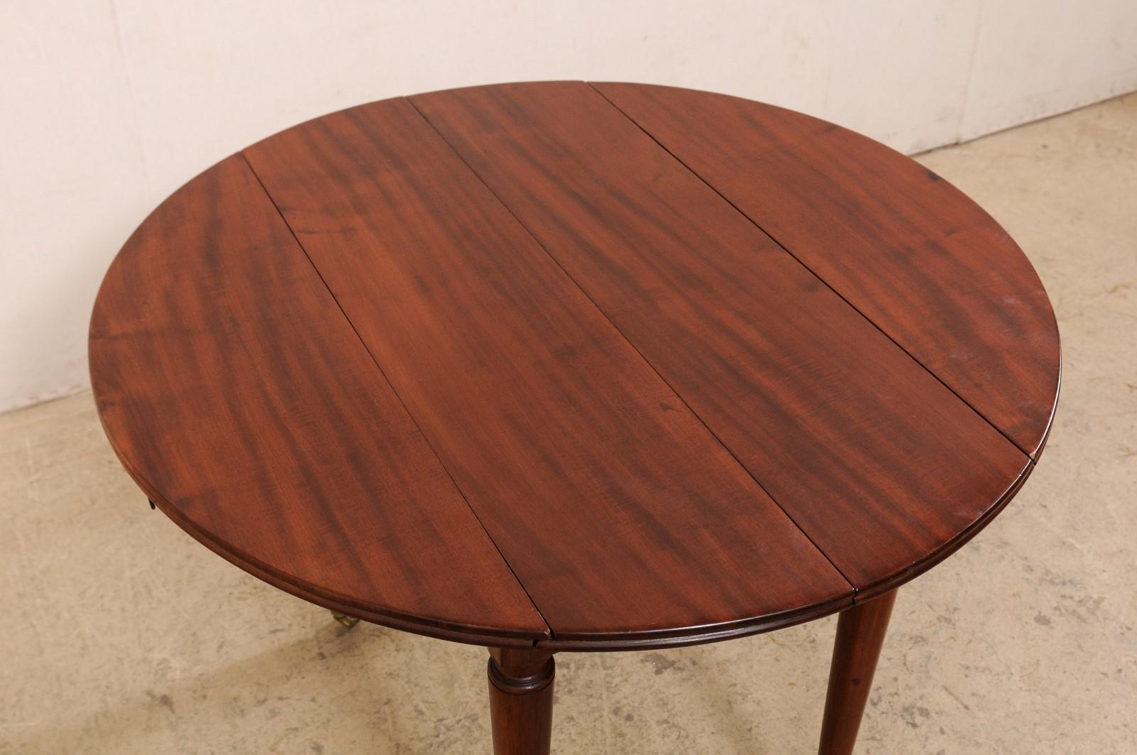 French 19th C. Mahogany Round Table W/Drop Leaves & Petite Brass Caster Feet For Sale 2