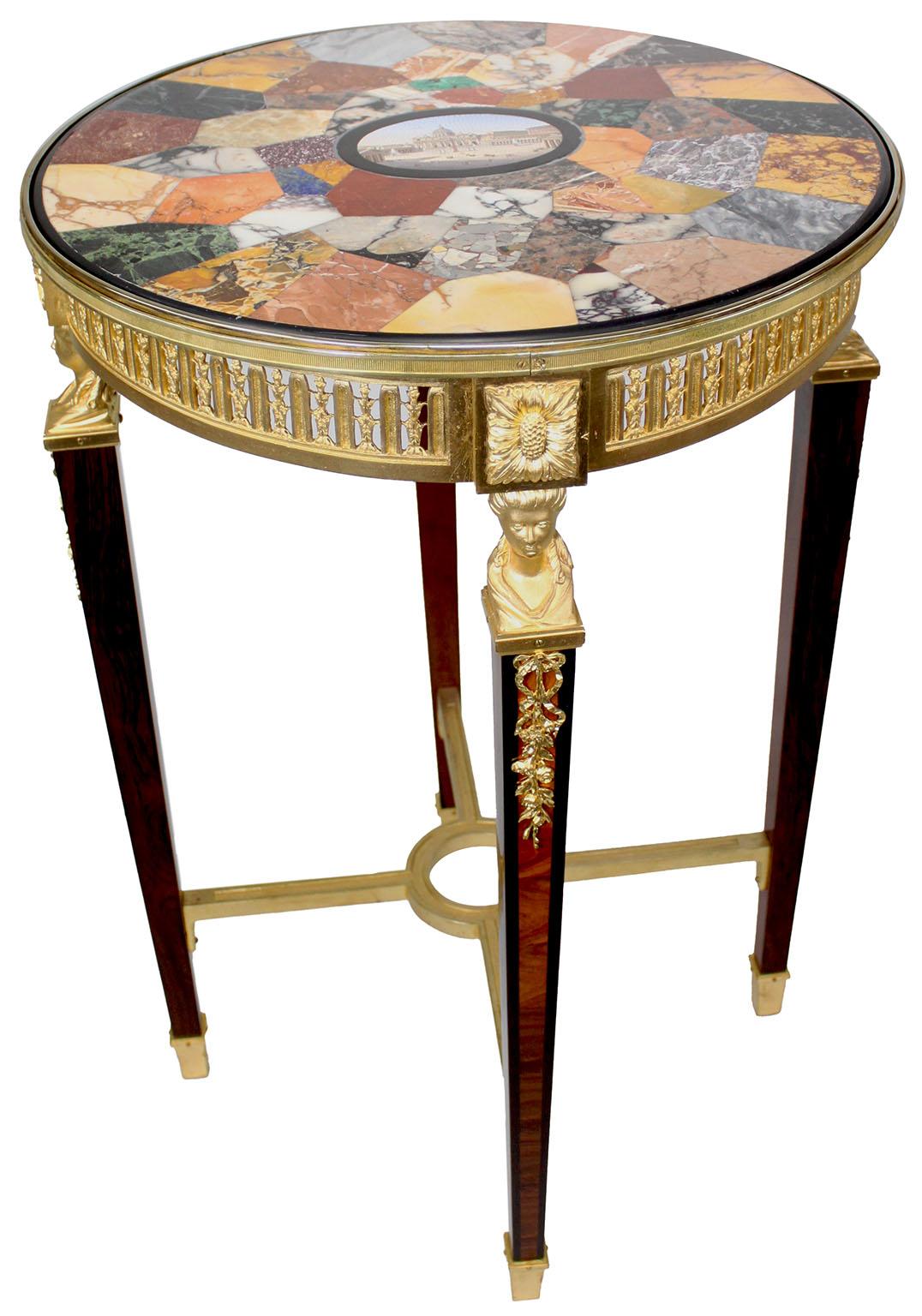 A Very Fine French 19th Century Neoclassical Revival Gilt-Bronze Circular Guéridon Table with a Roman Micromosaic and Specimen marble top. The intricate pierced ormolu floral apron accented with leg-rosettes complements. The tabletop is adorned with