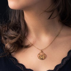 French 19th Century 18 Karat Rose Gold Haloed Virgin Medal
