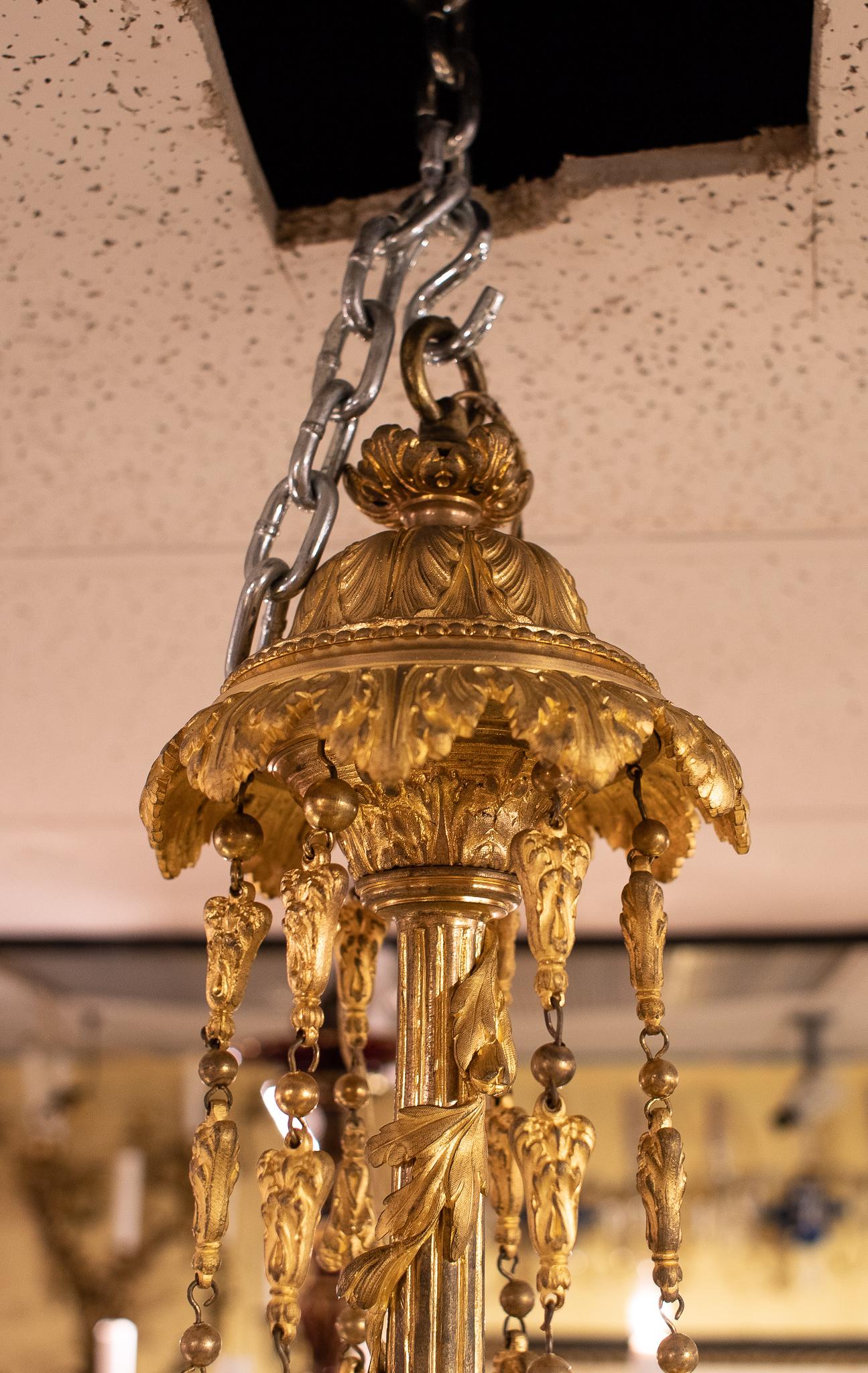 French 19th Century 18-Light Gilt Bronze Chandelier in Louis XVI Style In Good Condition For Sale In New York, NY