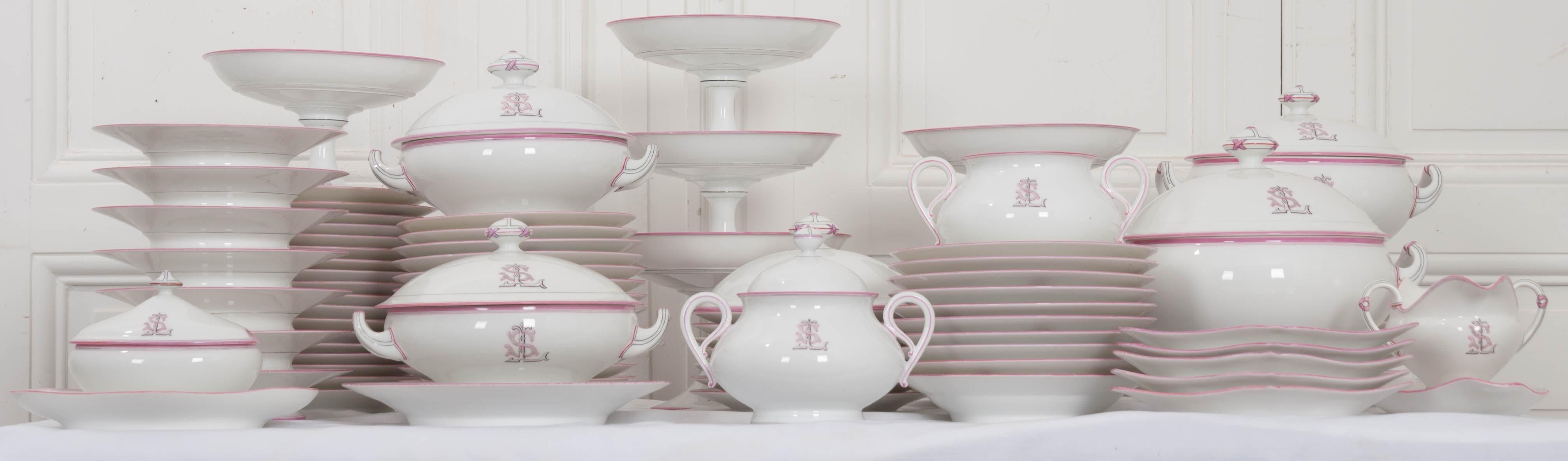 This lovely 19th century French Old Paris porcelain partial dinner service, circa 1860s, would complement most collections of Old Paris dinnerware beautifully. Each of the 95 pieces is banded in rose, a shade considered neutral in terms of Old Paris