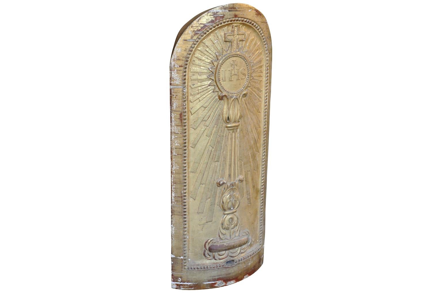 A very lovely mid-19th century Altar Fragment in gilt wood. Beautifully carved with a stunning sunburst.