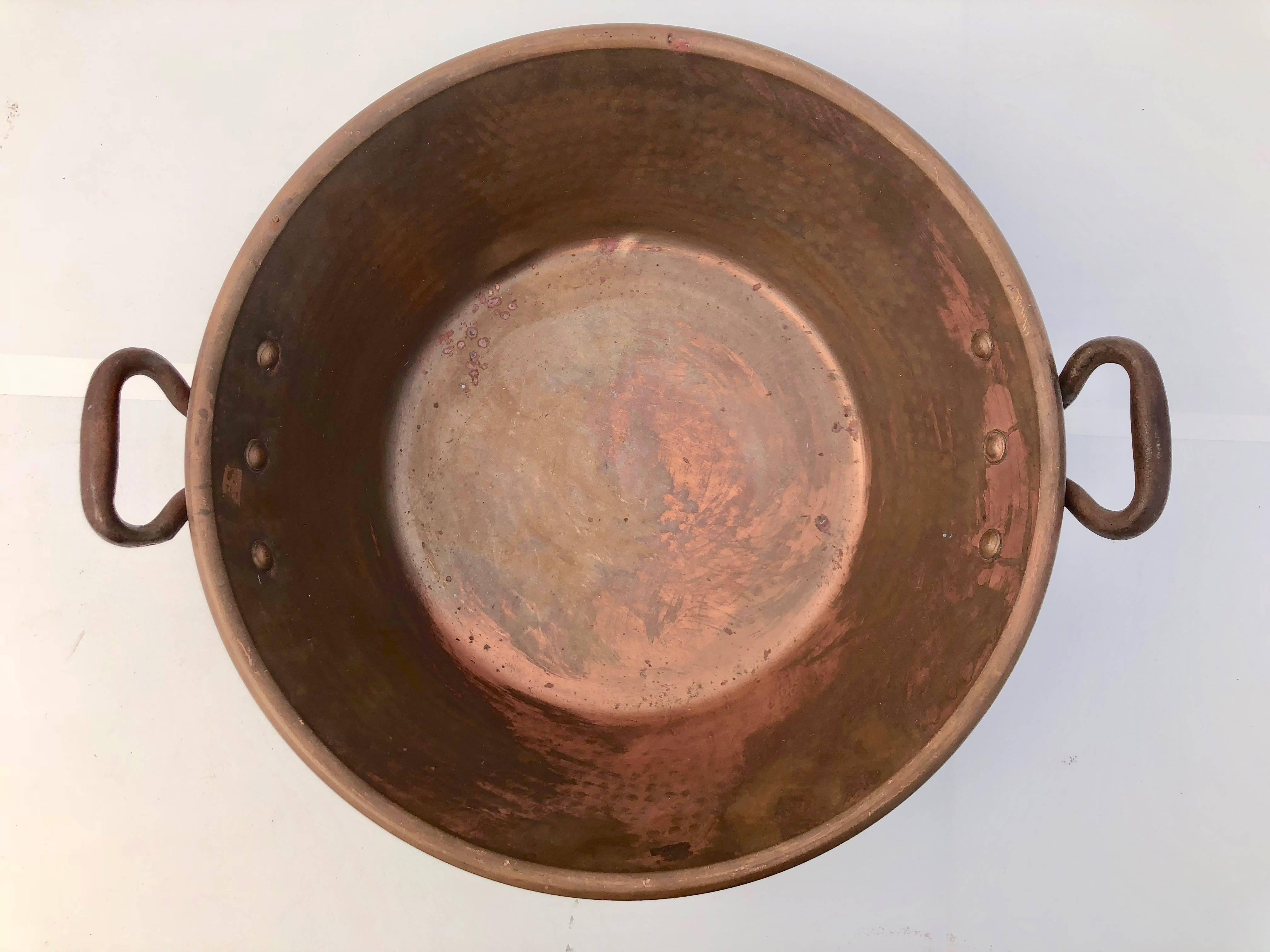 This French antique copper preserving pan with wrought iron handles was used to bake jam or other sweet food in the 1800s. The three reasons why these copper pans work so well is that it- evenly spreads the heat and, since most fruit contain pectin