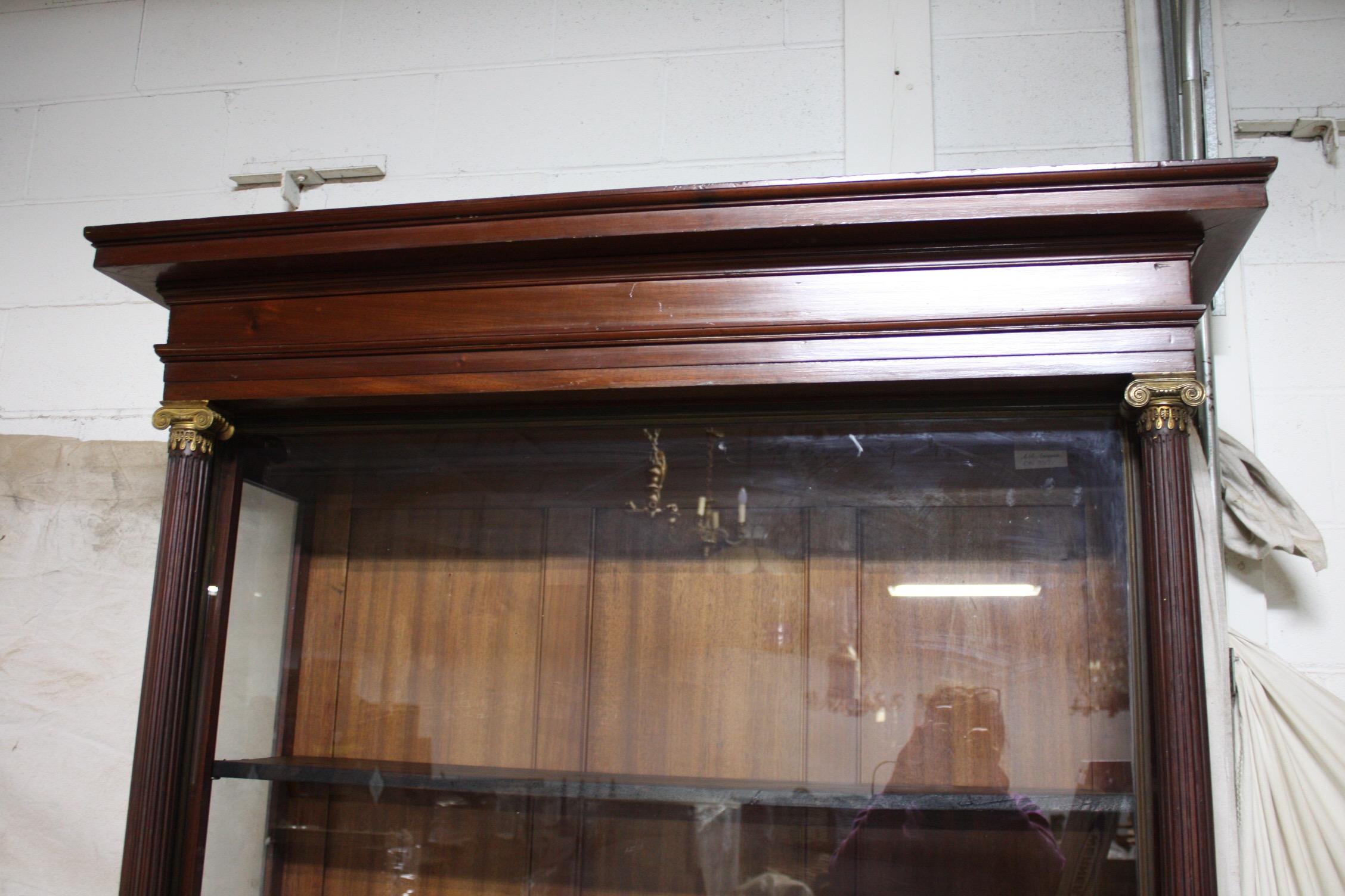 apothecary cabinet with glass doors