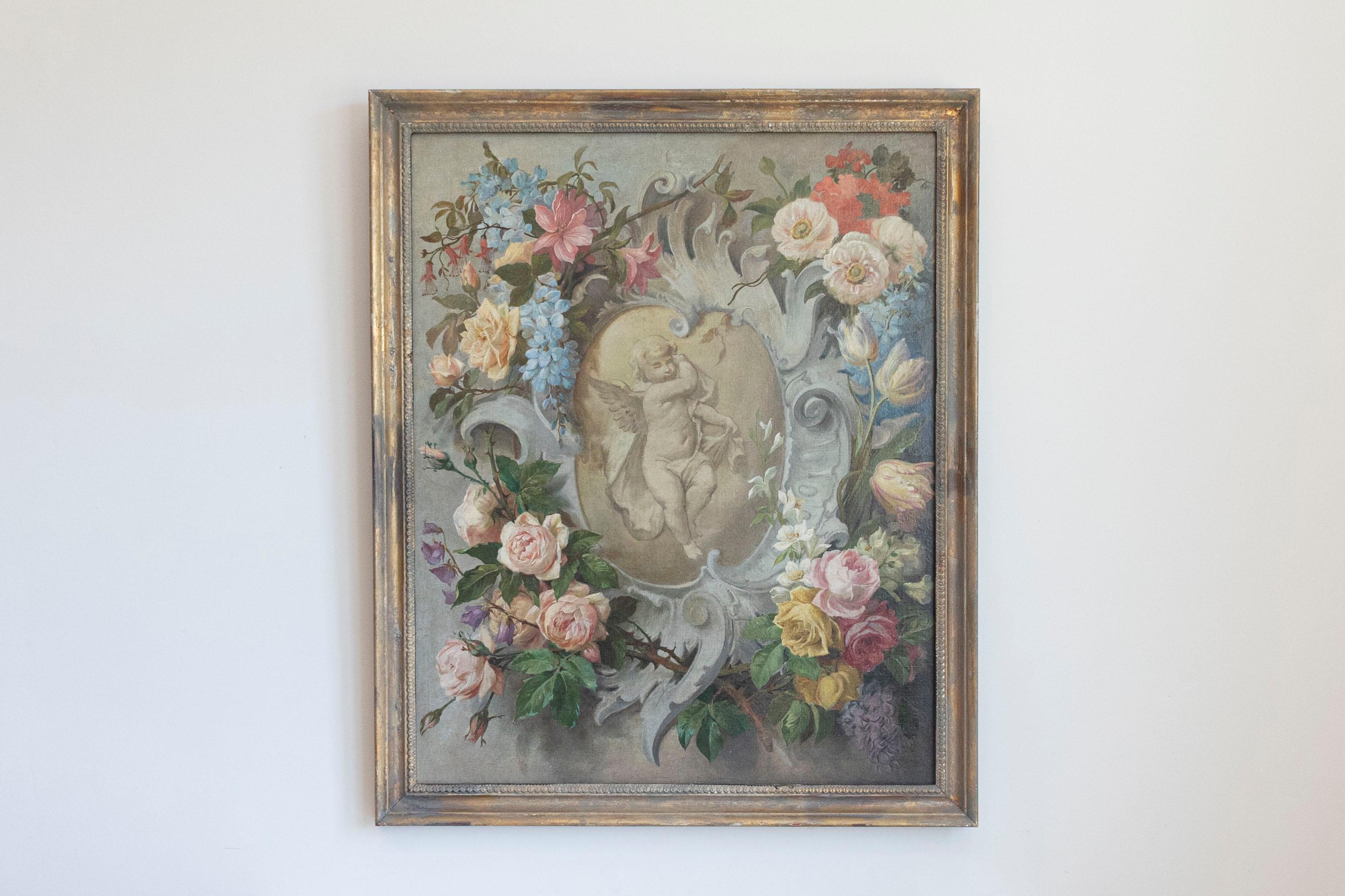 A French Aubusson cartoon painting from the 19th century, with floral decor surrounding a cherub populated cartouche. Created to be used as a model to weave a tapestry in the Aubusson manufacture located in central France, this framed oil painting