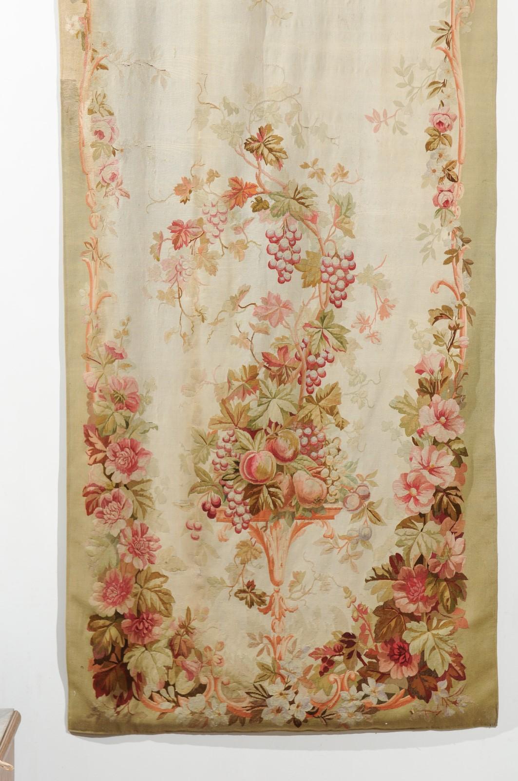 Two French vertical Aubusson tapestries from the 19th century with flowers and fruits, priced and sold individually. Born in the famous Aubusson Manufacture located in central France during the 19th century, each of these tapestries features an