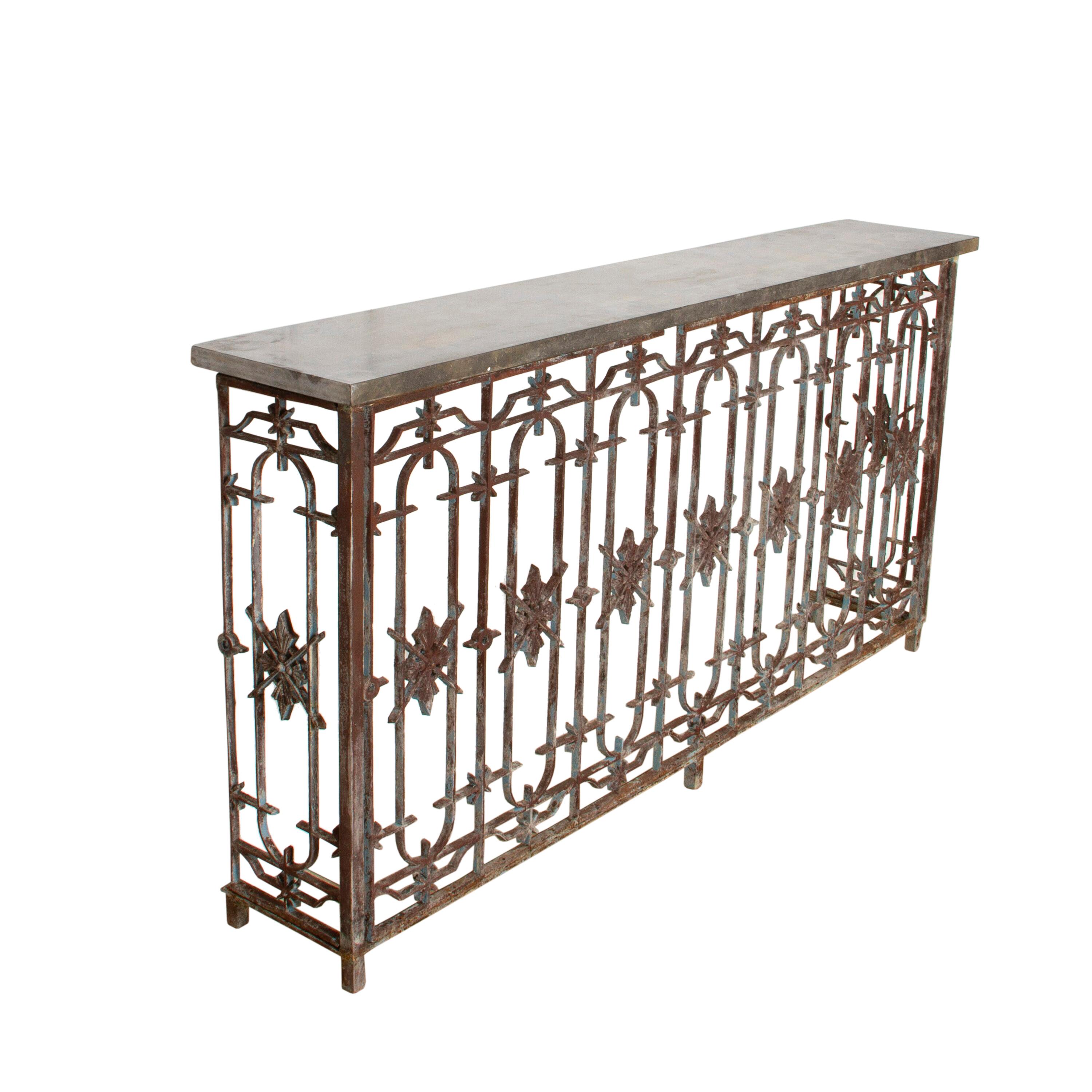 Striking 19th century balcony console. Originally from France, this console would have surrounded a window, overlooking the landscape. This console is a fine example of French ironmongery because of its stability and craftsmanship. It is decorated