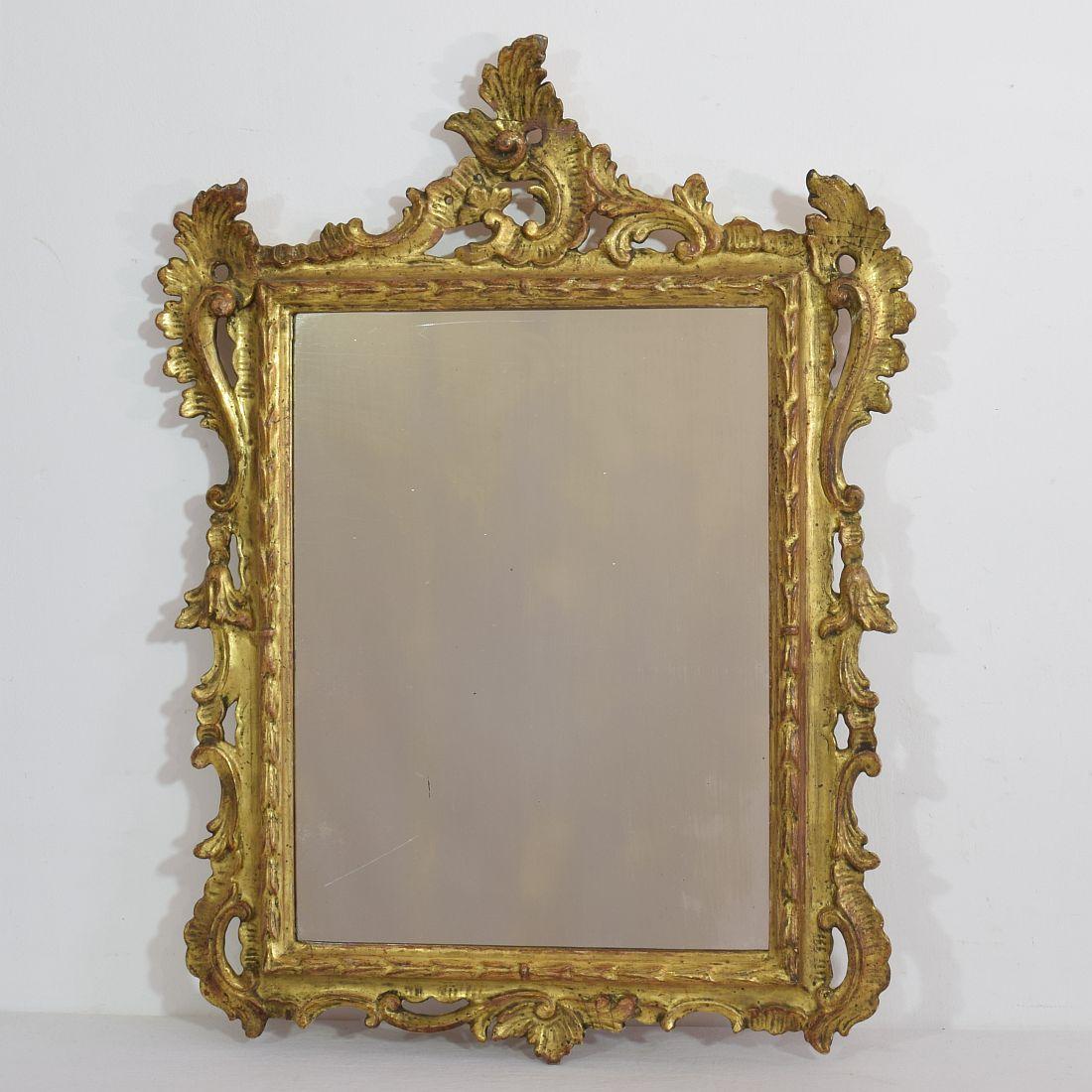 Nice carved wooden mirror in Baroque style 
France, circa 1850-1900. Weathered,small losses and old repair.