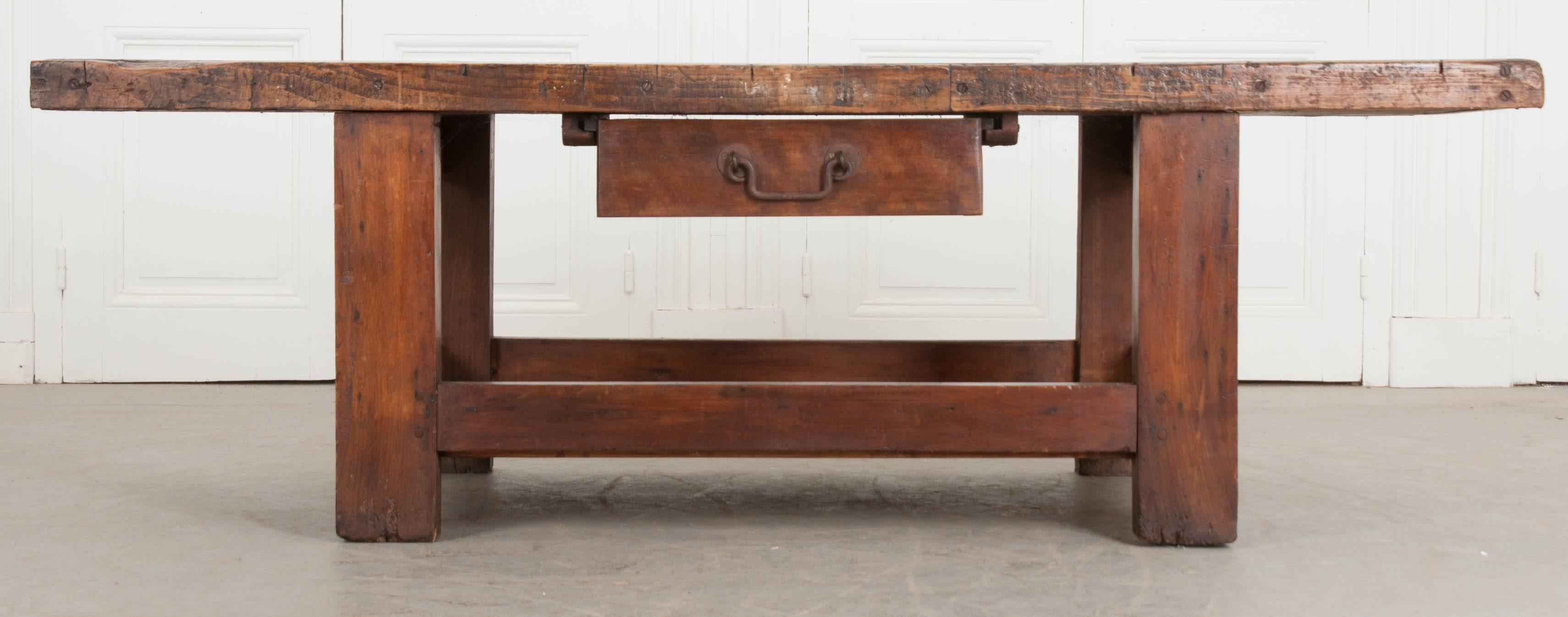 Thick, solid beechwood boards were used in the construction of this awesome 19th century French work table. The top if full of character, left by history’s craftsmen. Evidence of their work is preserved in the beechwood top. From the top hangs a