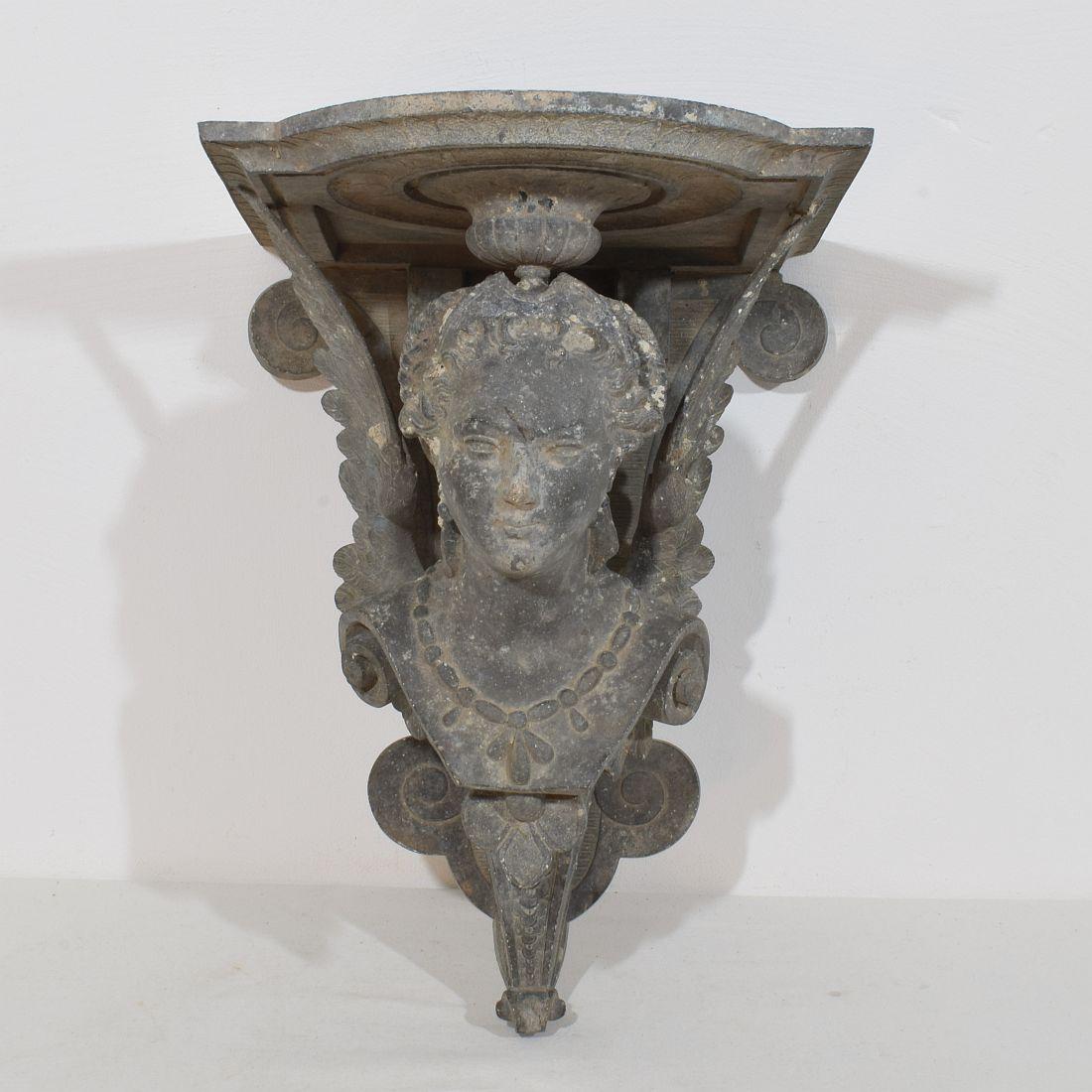 Amazing cast zinc alloy console depicting a winged woman's bust. Beautiful details and patine.
France circa 1880
Weathered. More photo's on request.
