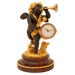 French 19th century Belle Époque period Louis XVI st. patinated Bronze, clock