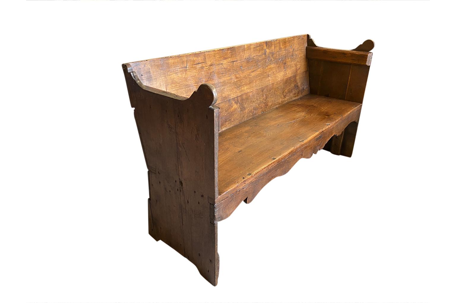 A very charming early 19th century bench from the South of France. Soundly constructed from beautiful chestnut. Excellent patina.