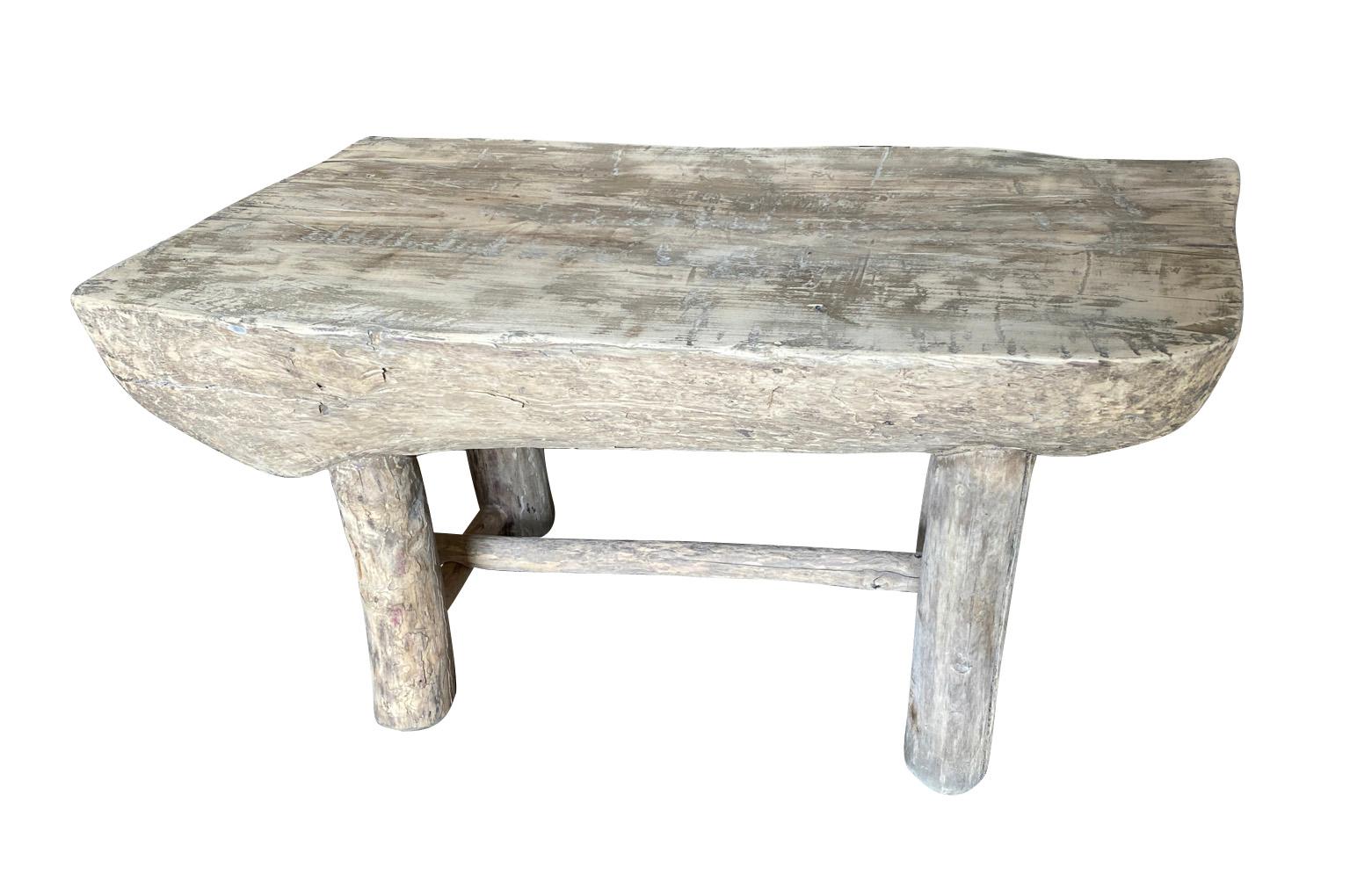 A very charming late 19th century Billot - Chopping Block from the South of France.  Soundly constructed from poplar.  Perfect as a coffee table - table basse.  Wonderful character and perfect for any rustic or contemporary surrounding.