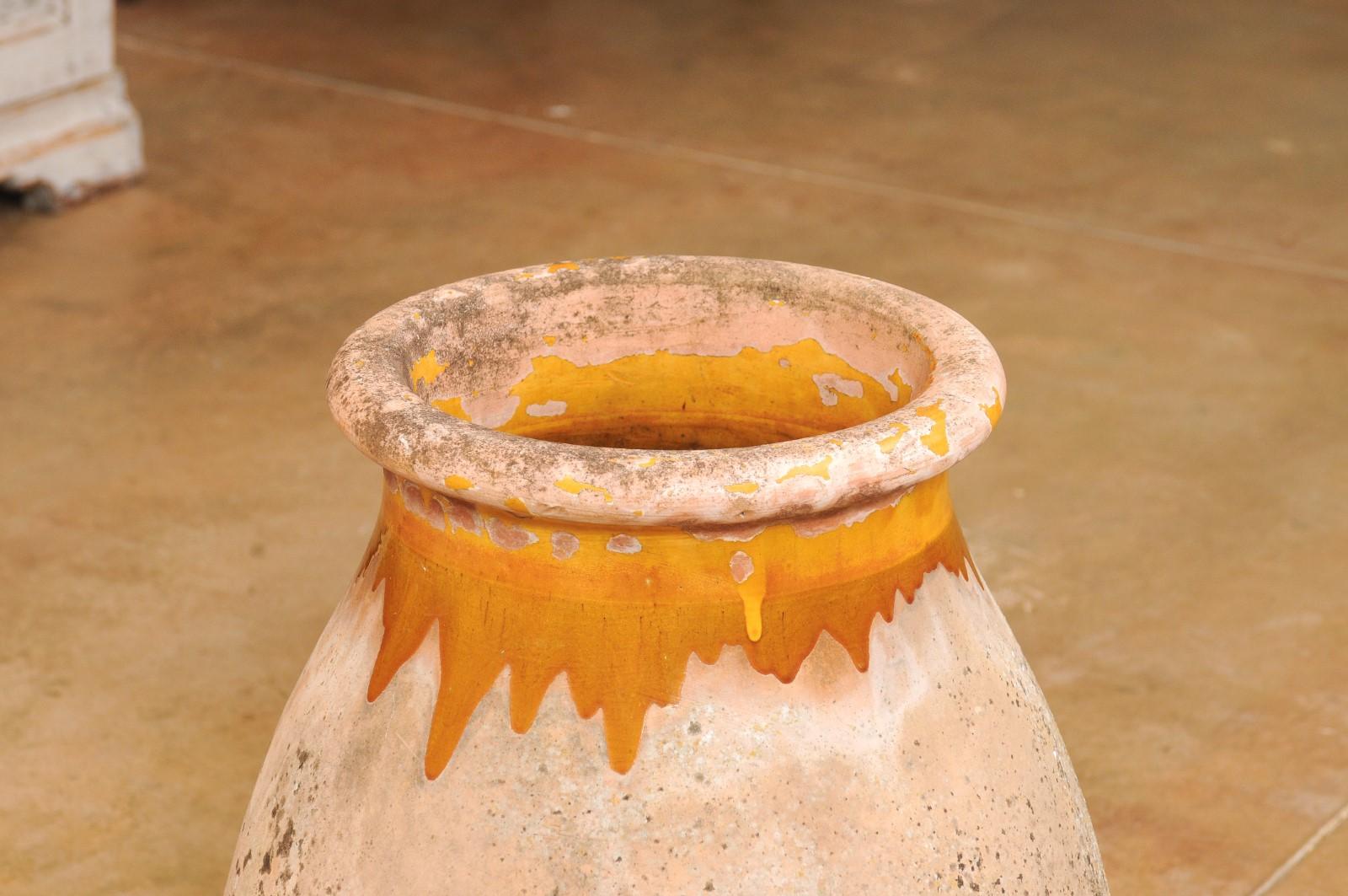 Glazed French 19th Century Biot Pottery Jar with Yellow Glaze and Dripping Effect For Sale