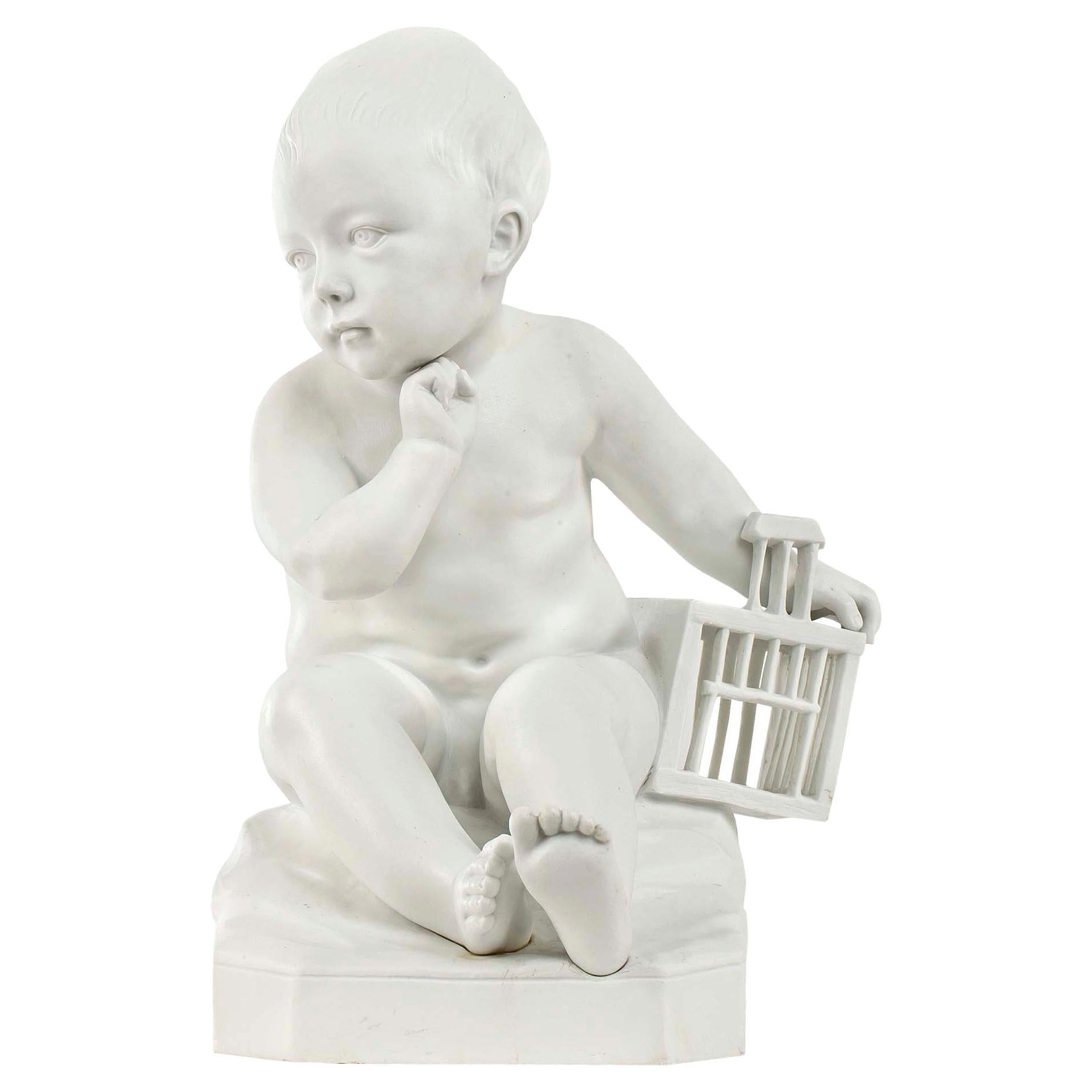 French 19th Century Biscuit De Sèvres Statuary of “Enfant À La Cage” For Sale