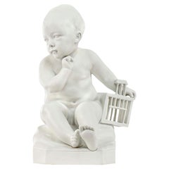 Französische 19. Jahrhundert Biscuit de Sèvres-Figur des „Enfant À La Cage“