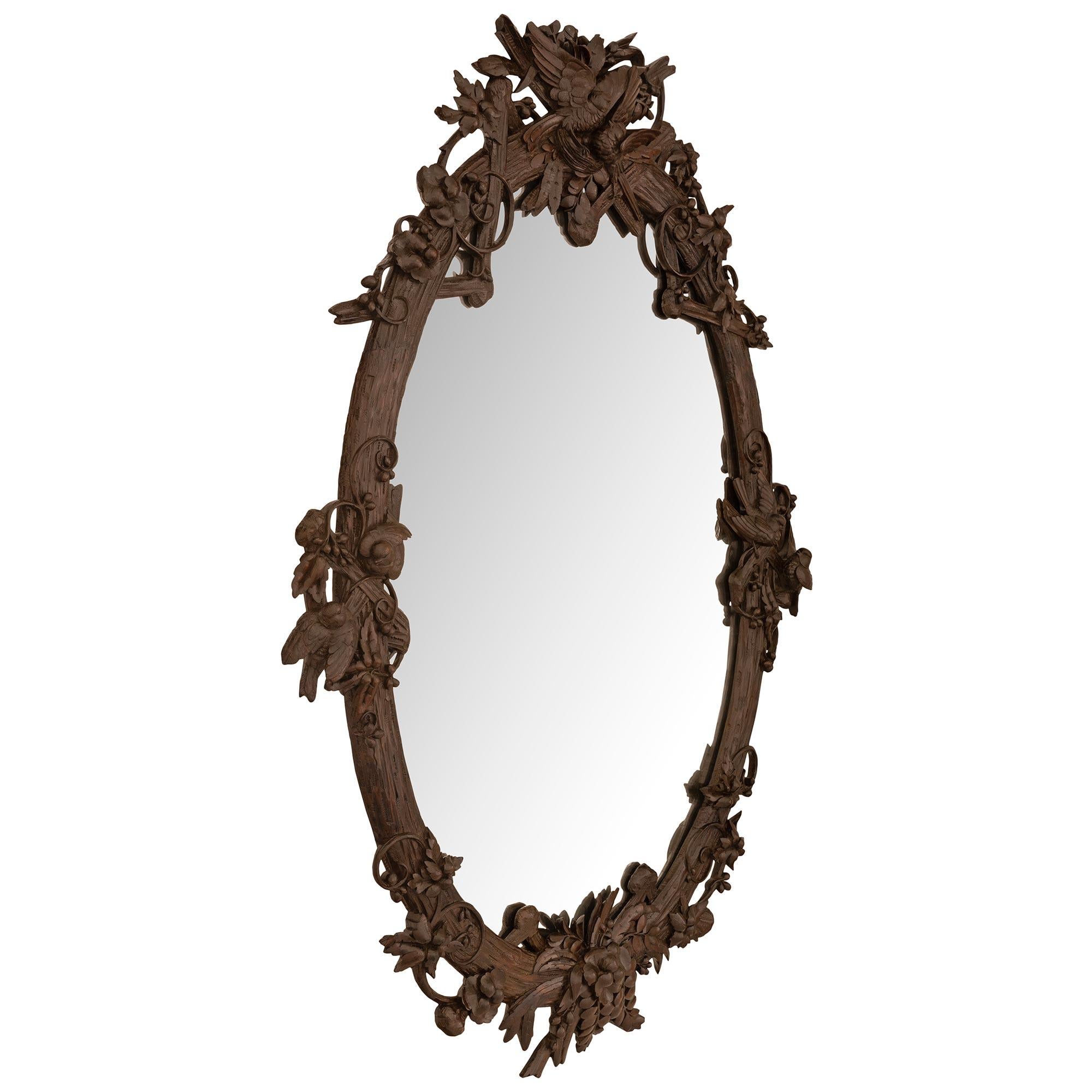 French 19th century Black Forest st. Walnut mirror In Good Condition For Sale In West Palm Beach, FL
