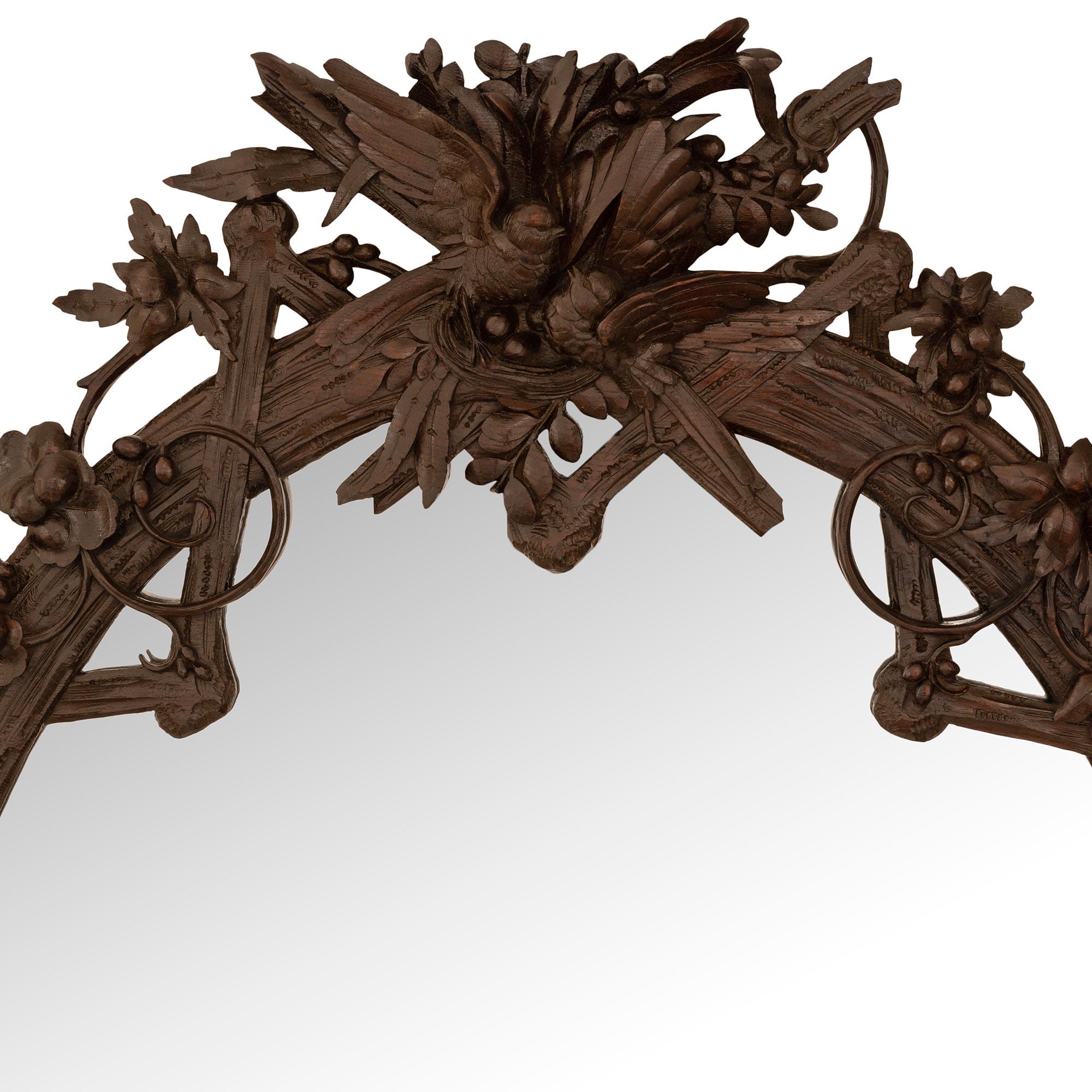 19th Century French 19th century Black Forest st. Walnut mirror For Sale