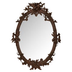 Antique French 19th century Black Forest st. Walnut mirror
