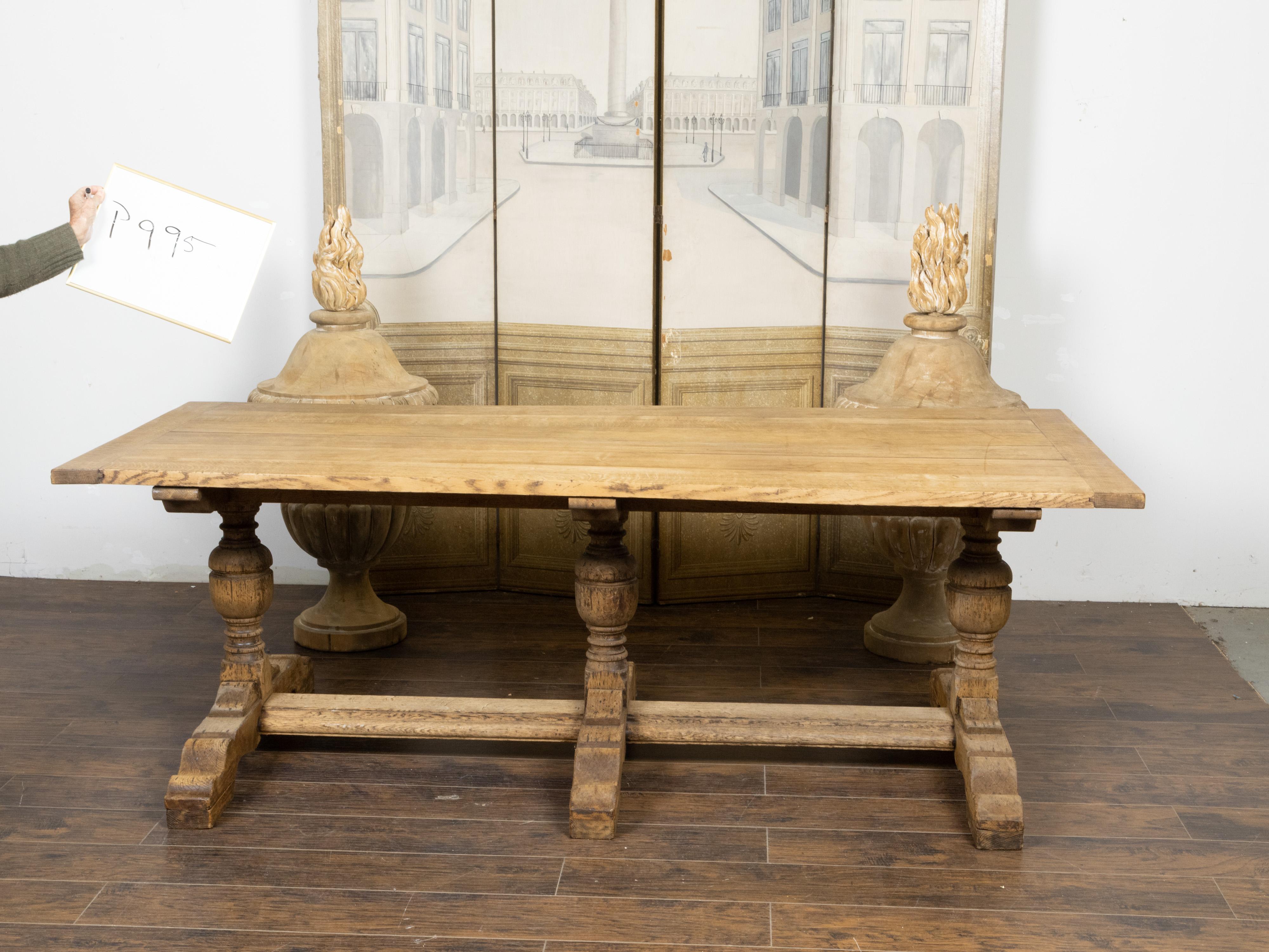 French 19th Century Bleached Oak Farm Table with Trestle Base and Baluster Legs For Sale 12