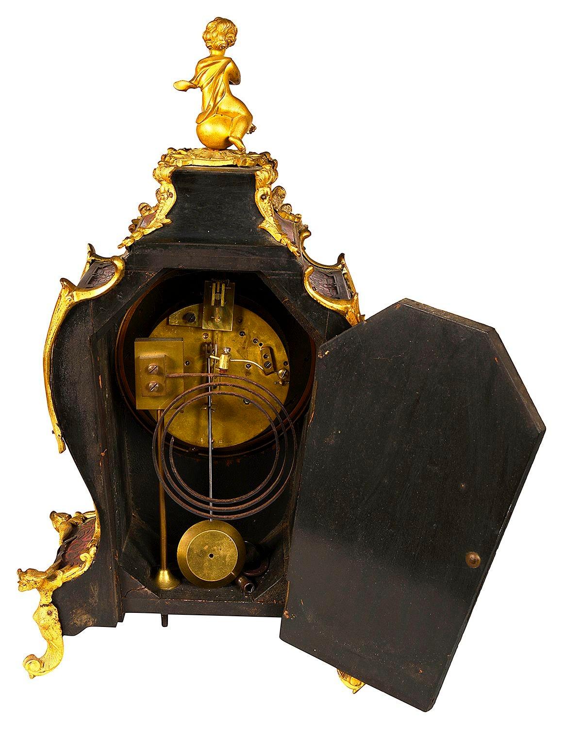Brass French 19th Century Boulle mantle clock. For Sale