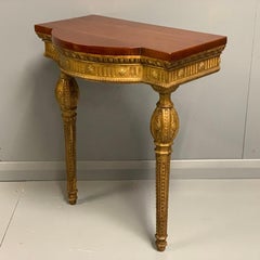 French 19th Century Bow Front Gilt Console Table with Mahogany Top
