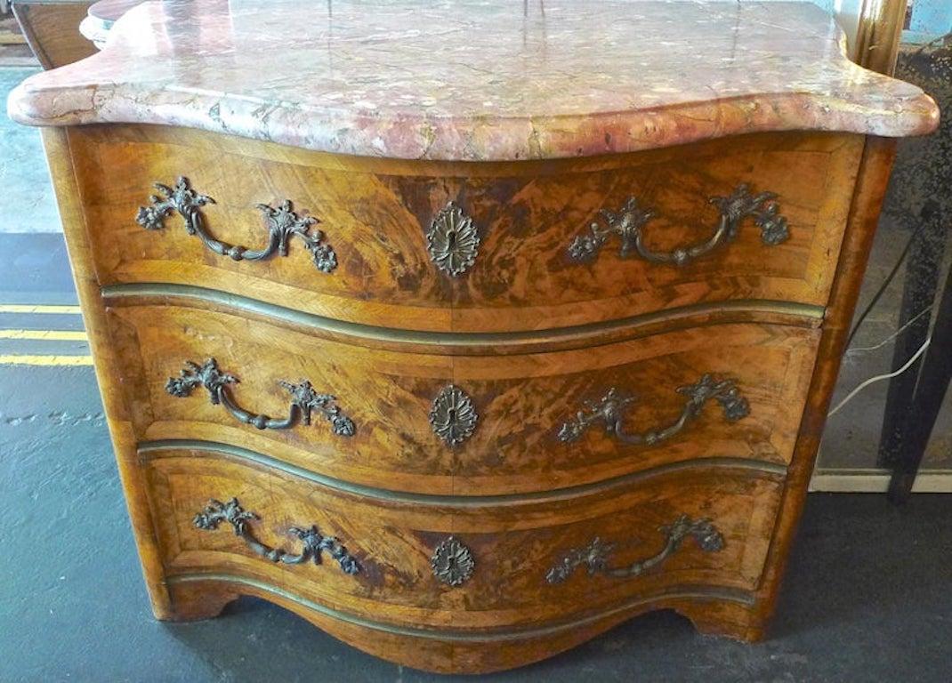 French 19th century bow-fronted burl walnut chest of drawers with a marble top and original hardware. A set is the chest and the marble top.