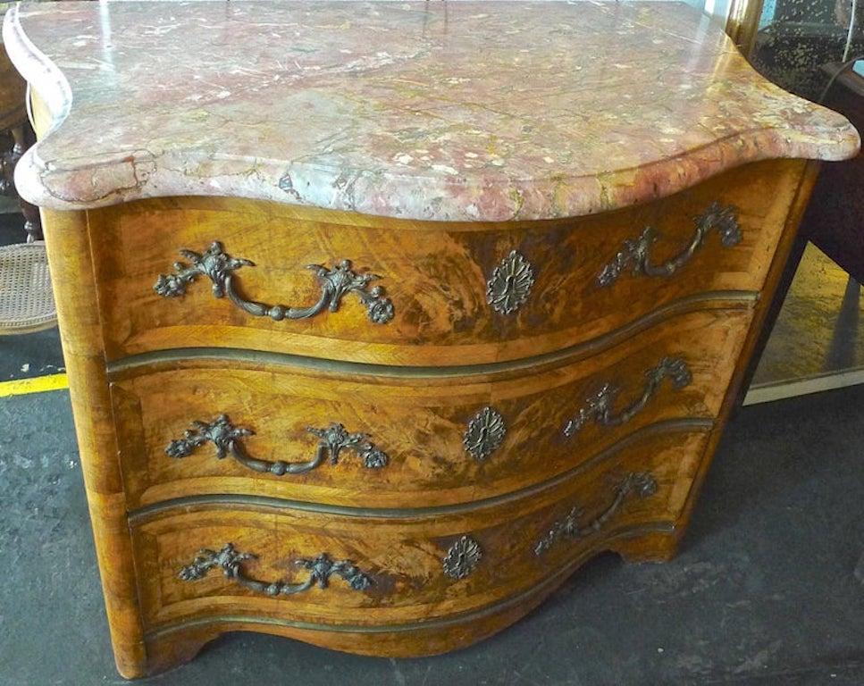 Veneer French 19th Century Bow-Fronted Burl Walnut Chest of Drawers with a Marble Top For Sale