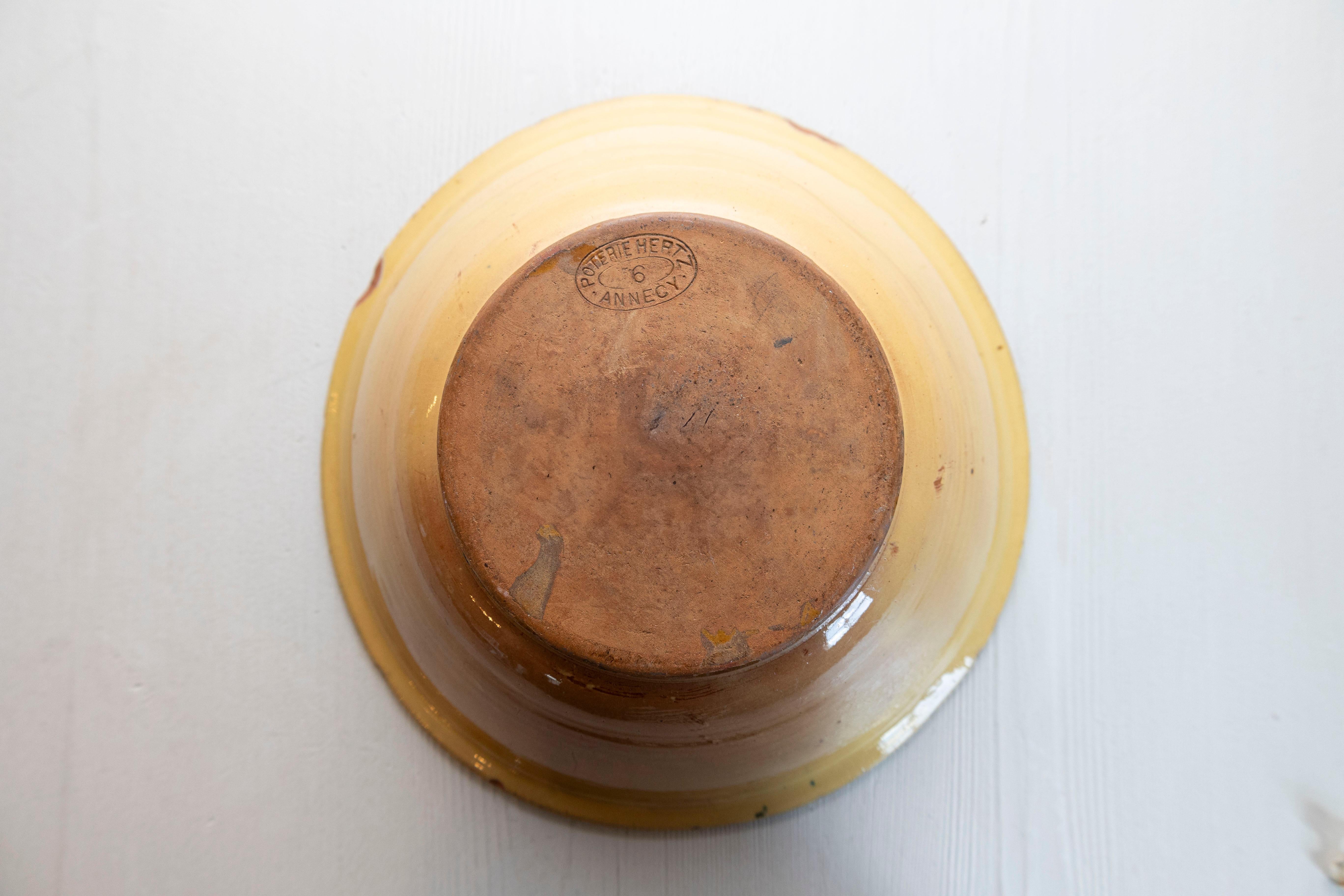 Pottery French 19th Century Bowl from the Poterie Hertz of Annecy, with Yellow Glaze For Sale