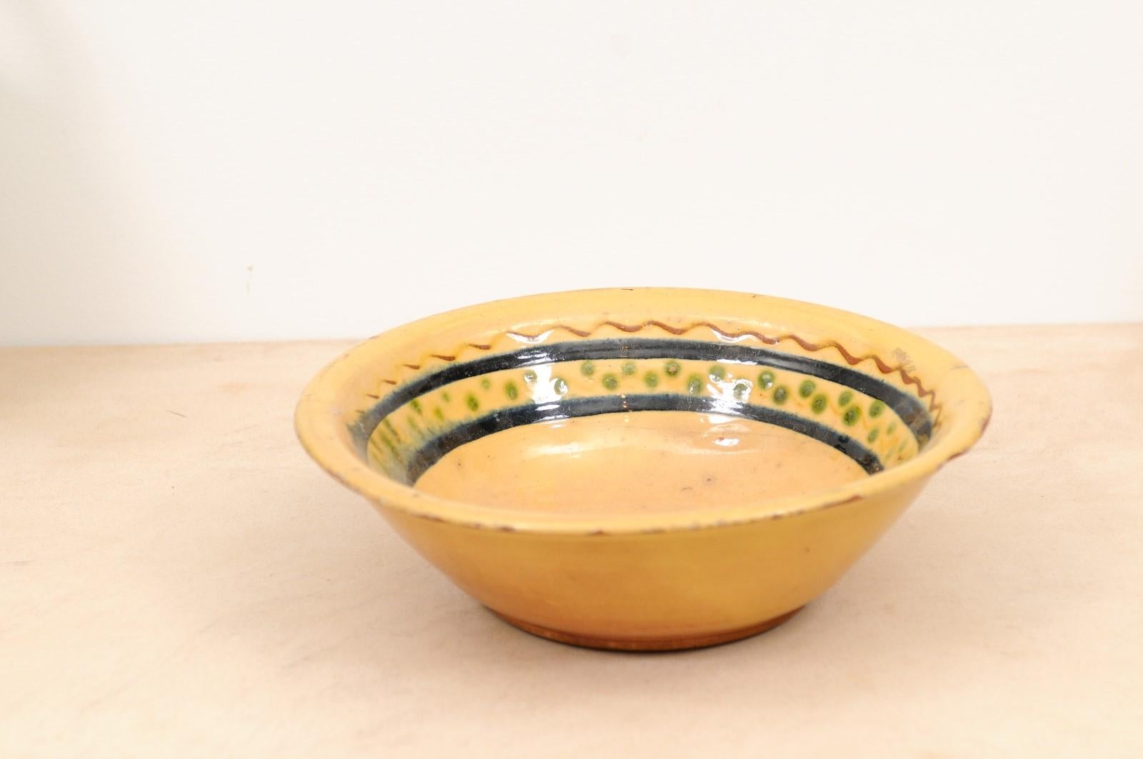 Pottery French 19th Century Bowl from the Poterie Hertz of Annecy, with Yellow Glaze For Sale